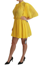 Dolce & Gabbana Yellow Pleated A-line Mini 100% Silk Dress -   -  Dolce & Gabbana.
