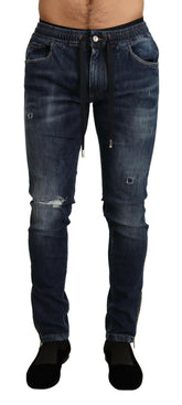 Dolce & Gabbana Blue Cotton Stretch Tattered Denim Jeans -   -  Dolce & Gabbana.