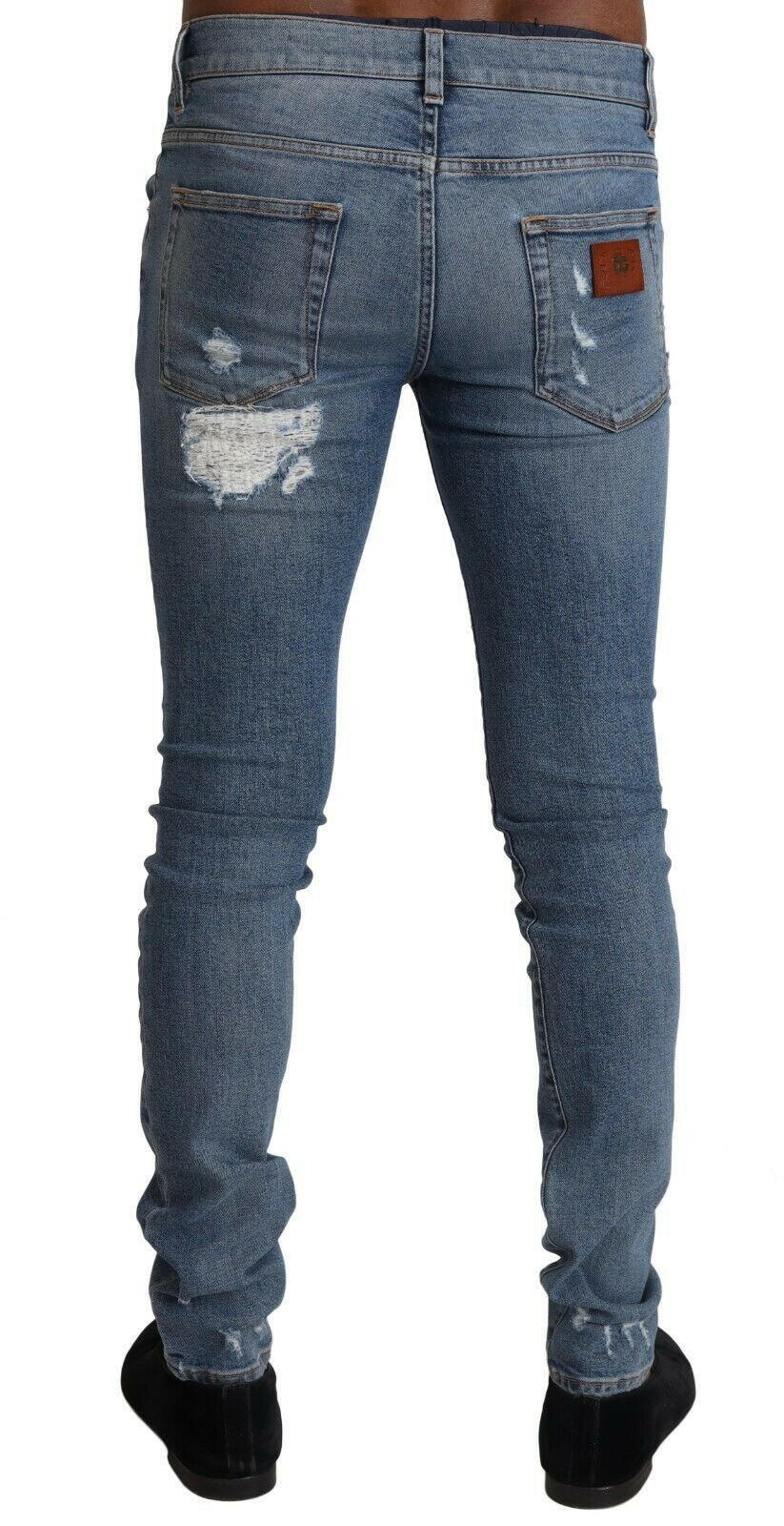 Dolce & Gabbana Light Blue Tattered Cotton Denim Skinny Jeans -   -  Dolce & Gabbana. Dolce & Gabbana Light Blue Tattered Cotton Denim Skinny Jeans -   -  Dolce & Gabbana.