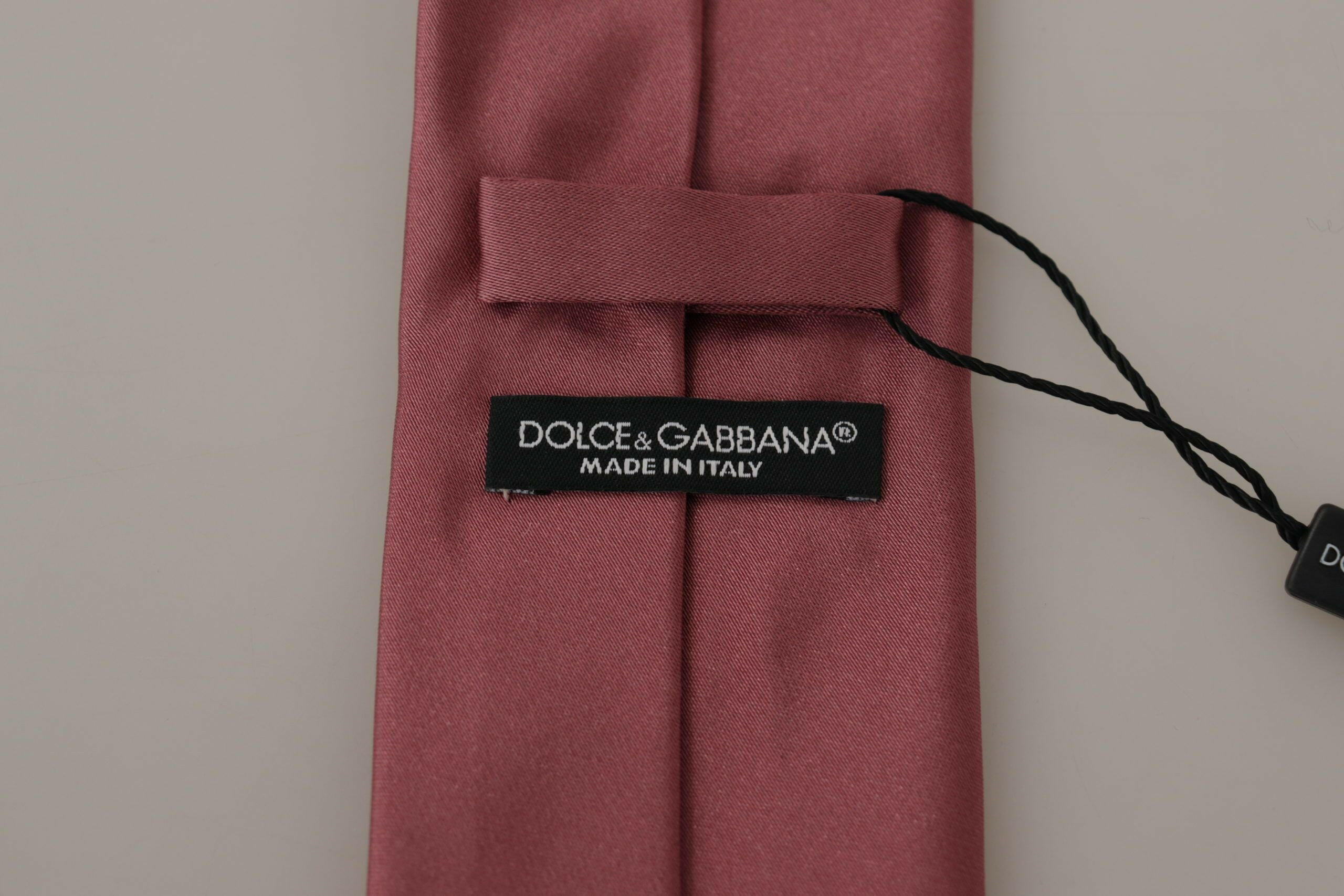 Dolce & Gabbana Pink Solid Print Silk Adjustable Necktie Accessory Tie -   -  Dolce & Gabbana. Dolce & Gabbana Pink Solid Print Silk Adjustable Necktie Accessory Tie -   -  Dolce & Gabbana.