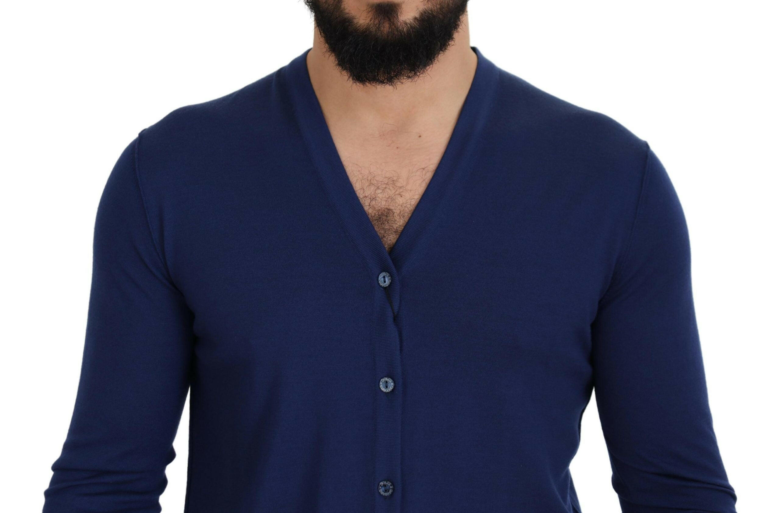 Dolce & Gabbana Blue Wool V-neck Button Down Cardigan Sweater -   -  Dolce & Gabbana. Dolce & Gabbana Blue Wool V-neck Button Down Cardigan Sweater -   -  Dolce & Gabbana.
