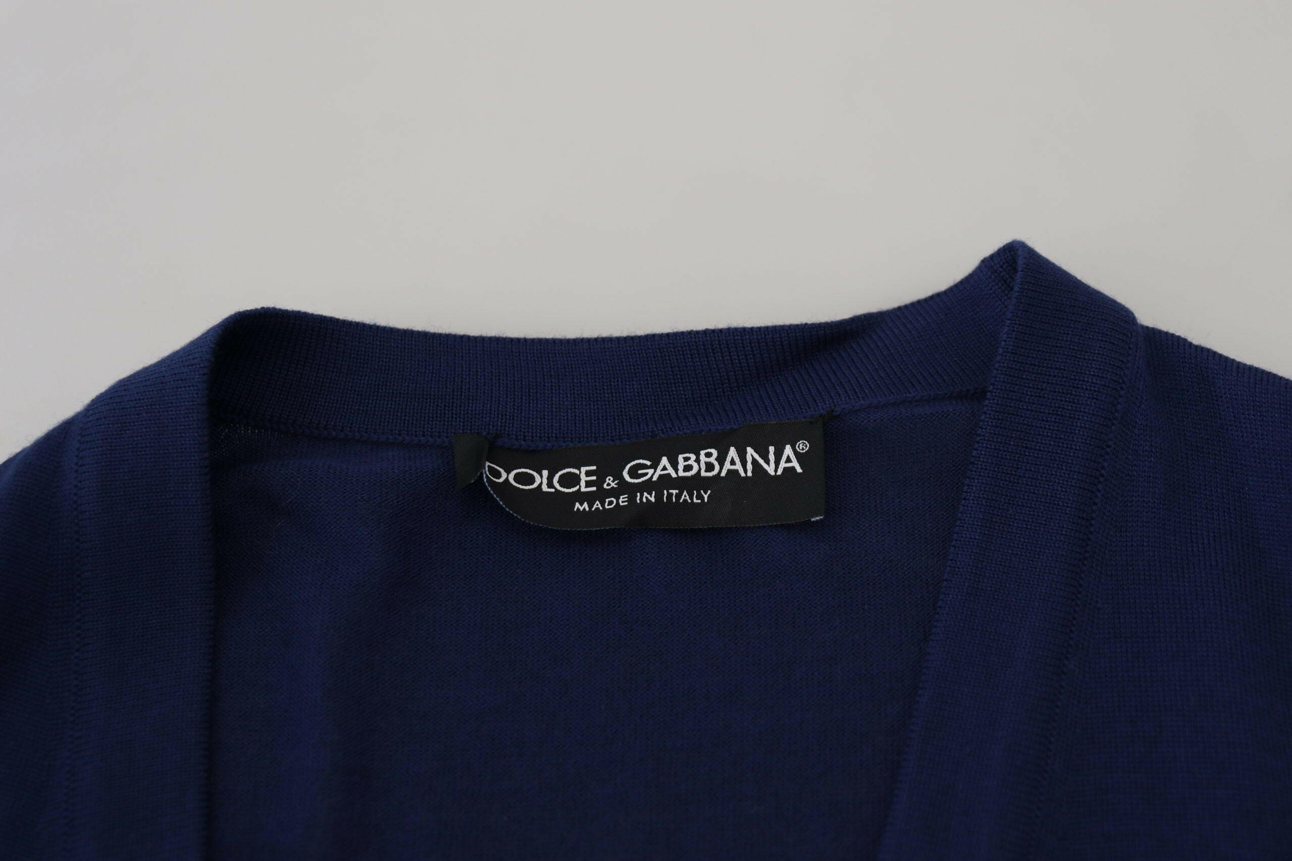 Dolce & Gabbana Blue Wool V-neck Button Down Cardigan Sweater -   -  Dolce & Gabbana. Dolce & Gabbana Blue Wool V-neck Button Down Cardigan Sweater -   -  Dolce & Gabbana.