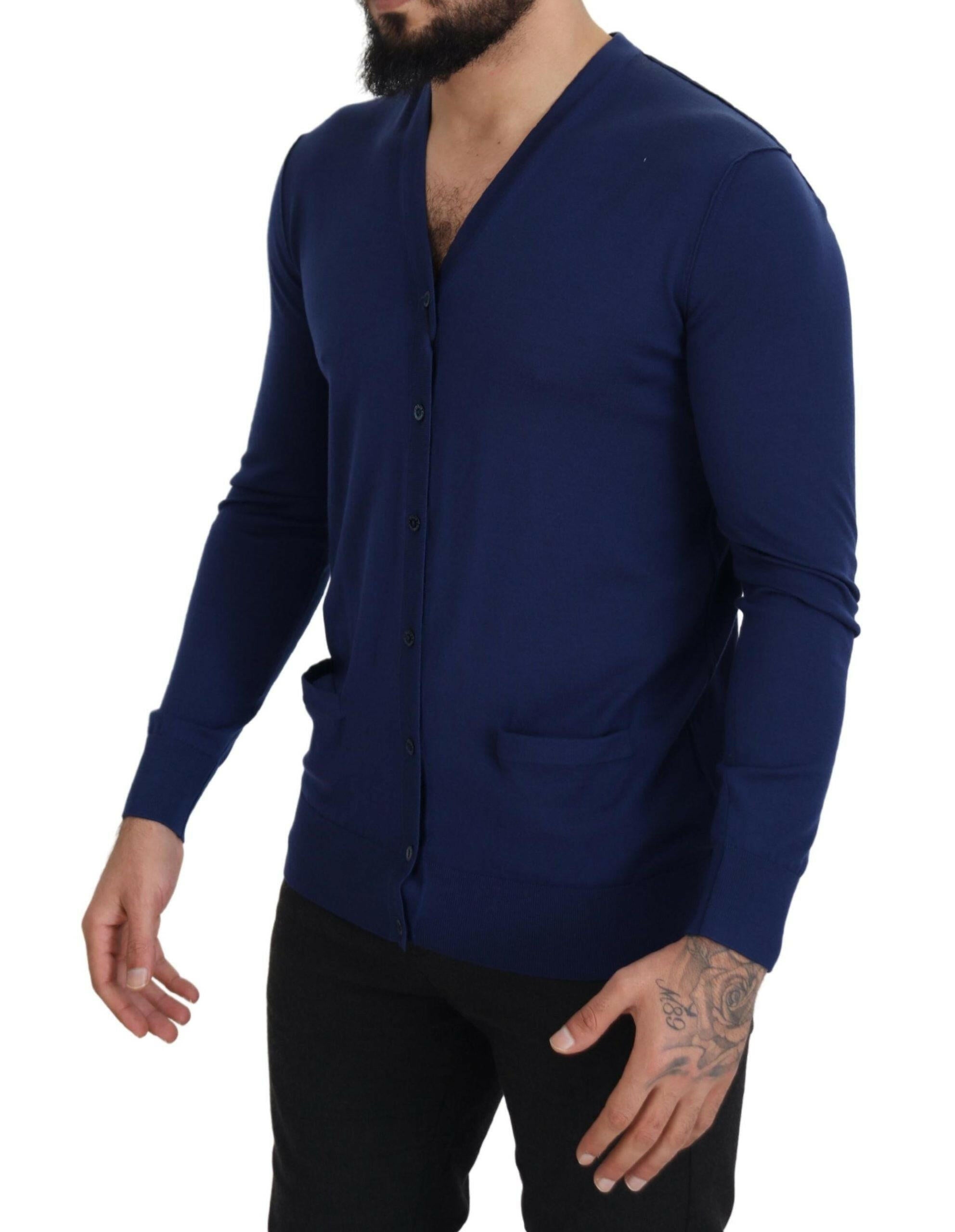 Dolce & Gabbana Blue Wool V-neck Button Down Cardigan Sweater -   -  Dolce & Gabbana. Dolce & Gabbana Blue Wool V-neck Button Down Cardigan Sweater -   -  Dolce & Gabbana.