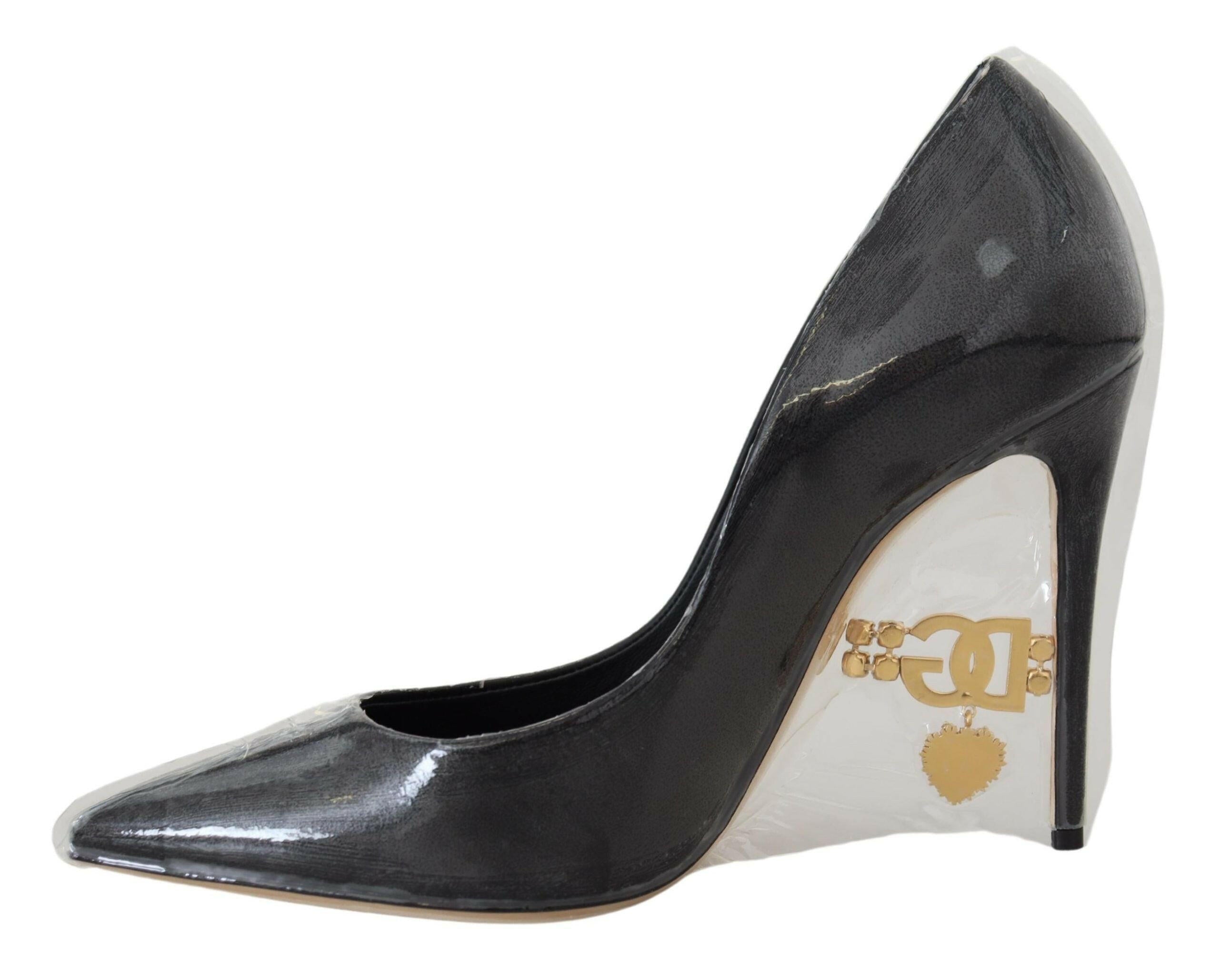 Dolce & Gabbana Black Leather Heels Pumps Plastic Wrapped Shoes -   -  Dolce & Gabbana. Dolce & Gabbana Black Leather Heels Pumps Plastic Wrapped Shoes -   -  Dolce & Gabbana.
