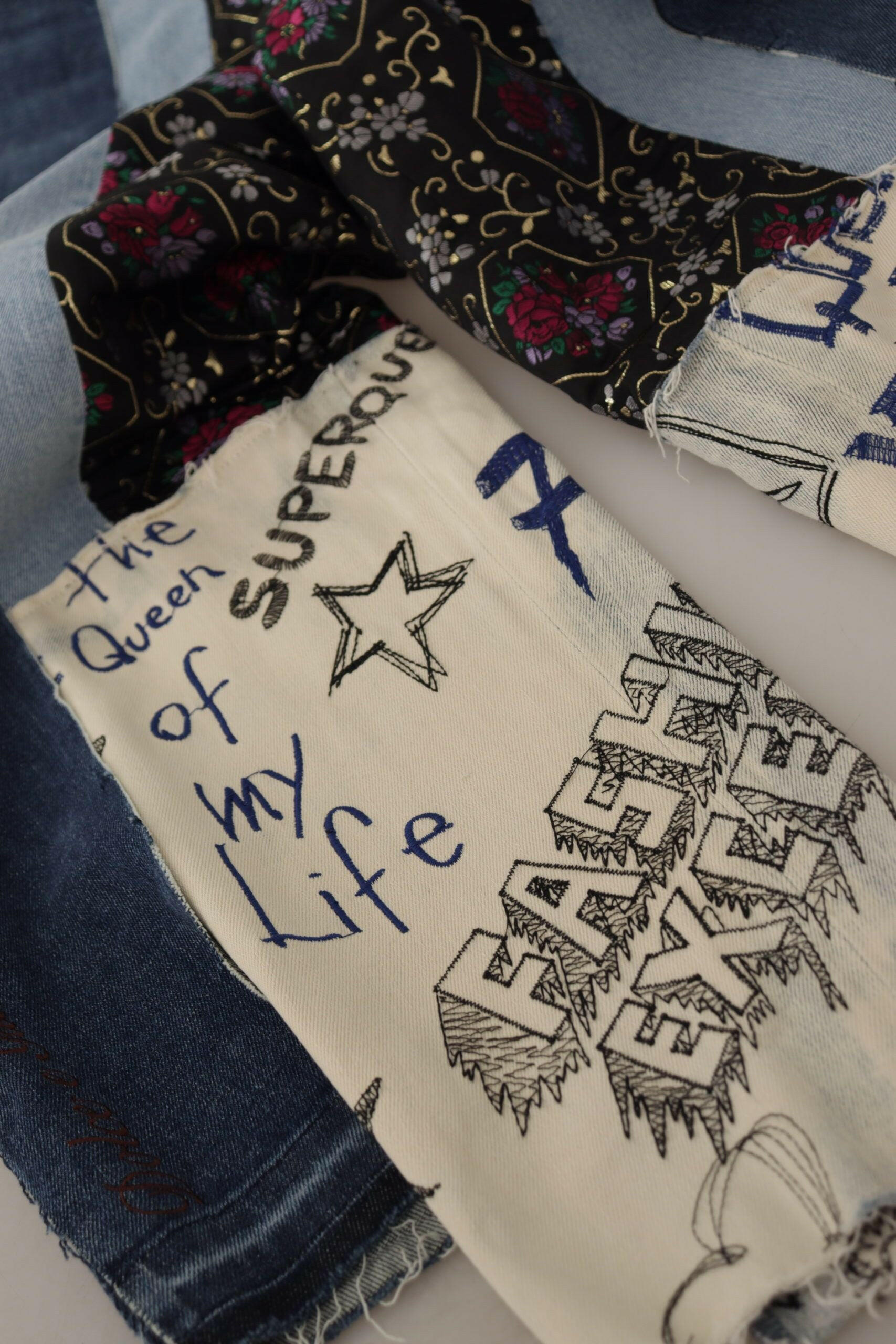 Dolce & Gabbana Multicolor Patchwork DG Fashion Wide Leg Denim Pant -   -  Dolce & Gabbana. Dolce & Gabbana Multicolor Patchwork DG Fashion Wide Leg Denim Pant -   -  Dolce & Gabbana.