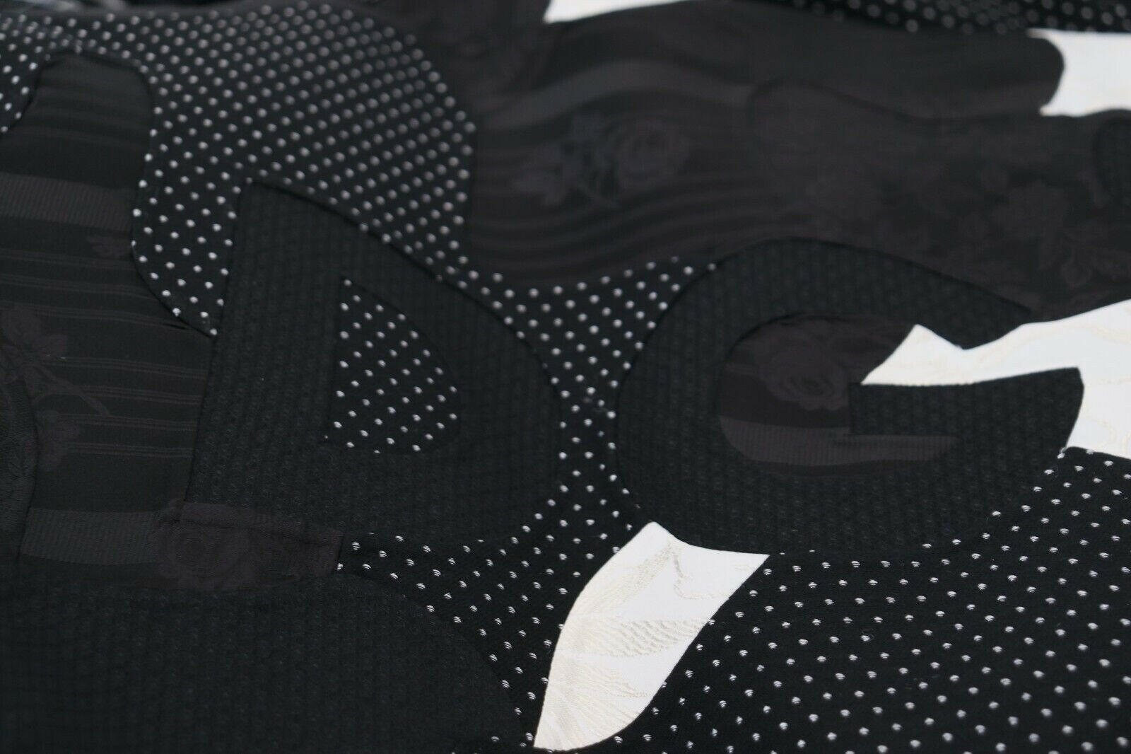 Dolce & Gabbana Black White Fur Shearling Full Zip Jacket -   -  Dolce & Gabbana. Dolce & Gabbana Black White Fur Shearling Full Zip Jacket -   -  Dolce & Gabbana.