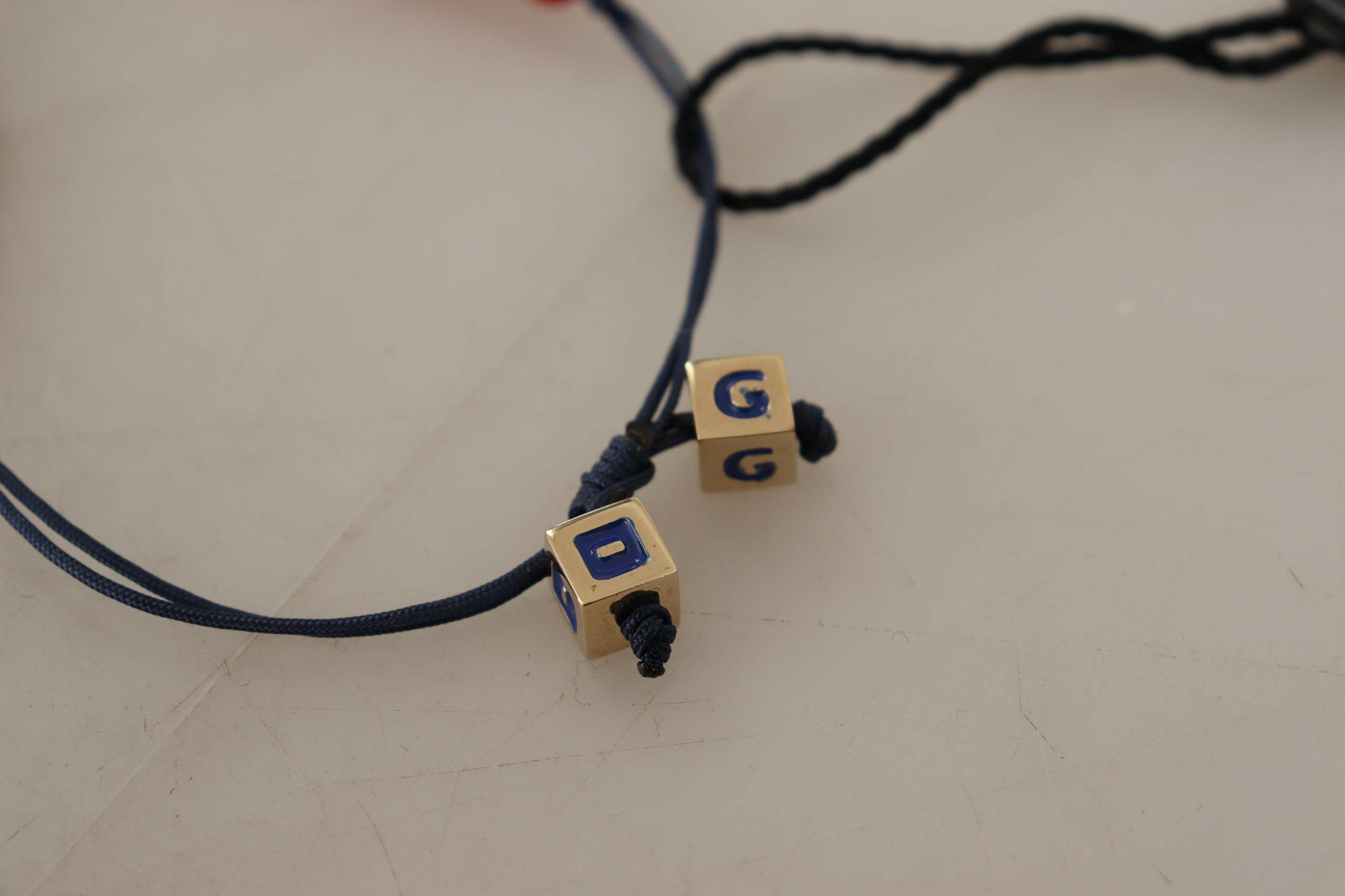 Dolce & Gabbana Red Blue Beaded DG LOVES LONDON Flag Branded Bracelet -   -  Dolce & Gabbana. Dolce & Gabbana Red Blue Beaded DG LOVES LONDON Flag Branded Bracelet -   -  Dolce & Gabbana.