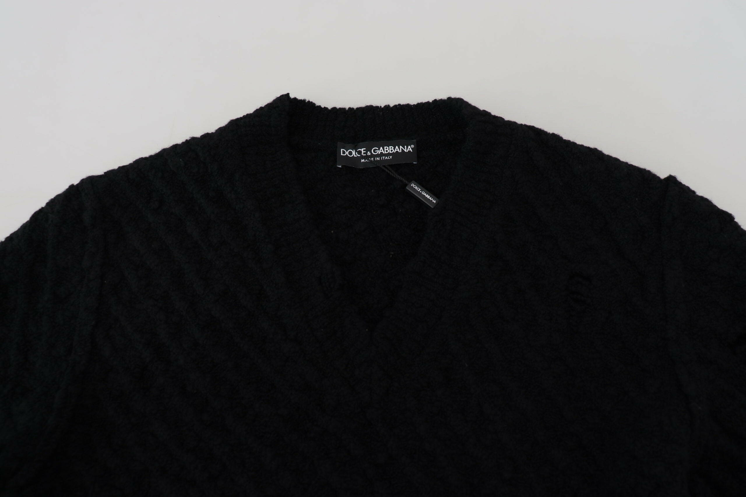 Dolce & Gabbana Black Wool V-neck Knitted Pullover Sweater -   -  Dolce & Gabbana. Dolce & Gabbana Black Wool V-neck Knitted Pullover Sweater -   -  Dolce & Gabbana.