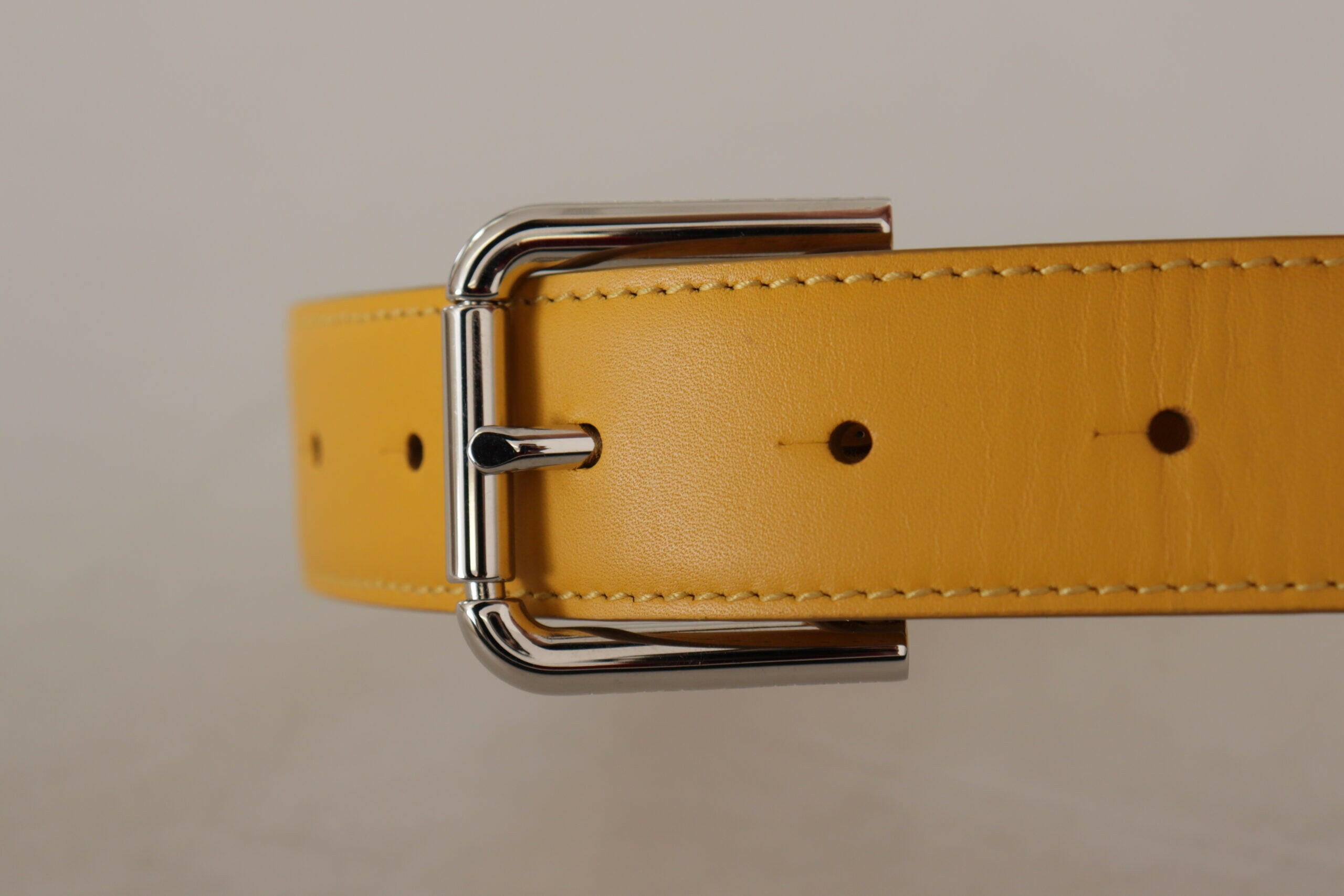 Dolce & Gabbana Yellow Leather Silver Tone Logo Metal Buckle Belt -   -  Dolce & Gabbana. Dolce & Gabbana Yellow Leather Silver Tone Logo Metal Buckle Belt -   -  Dolce & Gabbana.