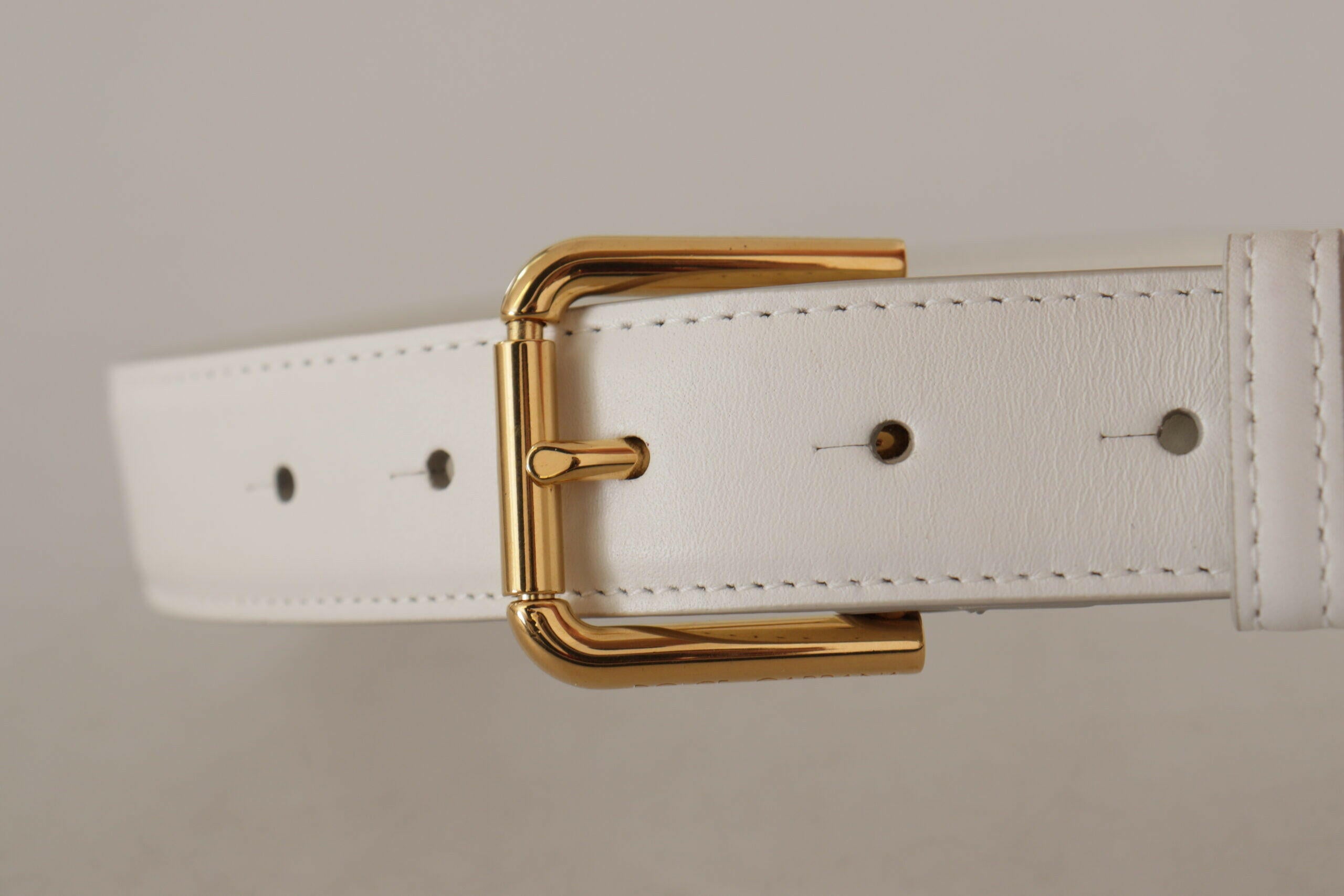 Dolce & Gabbana White Calf Leather Gold Tone Logo Metal Buckle Belt -   -  Dolce & Gabbana. Dolce & Gabbana White Calf Leather Gold Tone Logo Metal Buckle Belt -   -  Dolce & Gabbana.