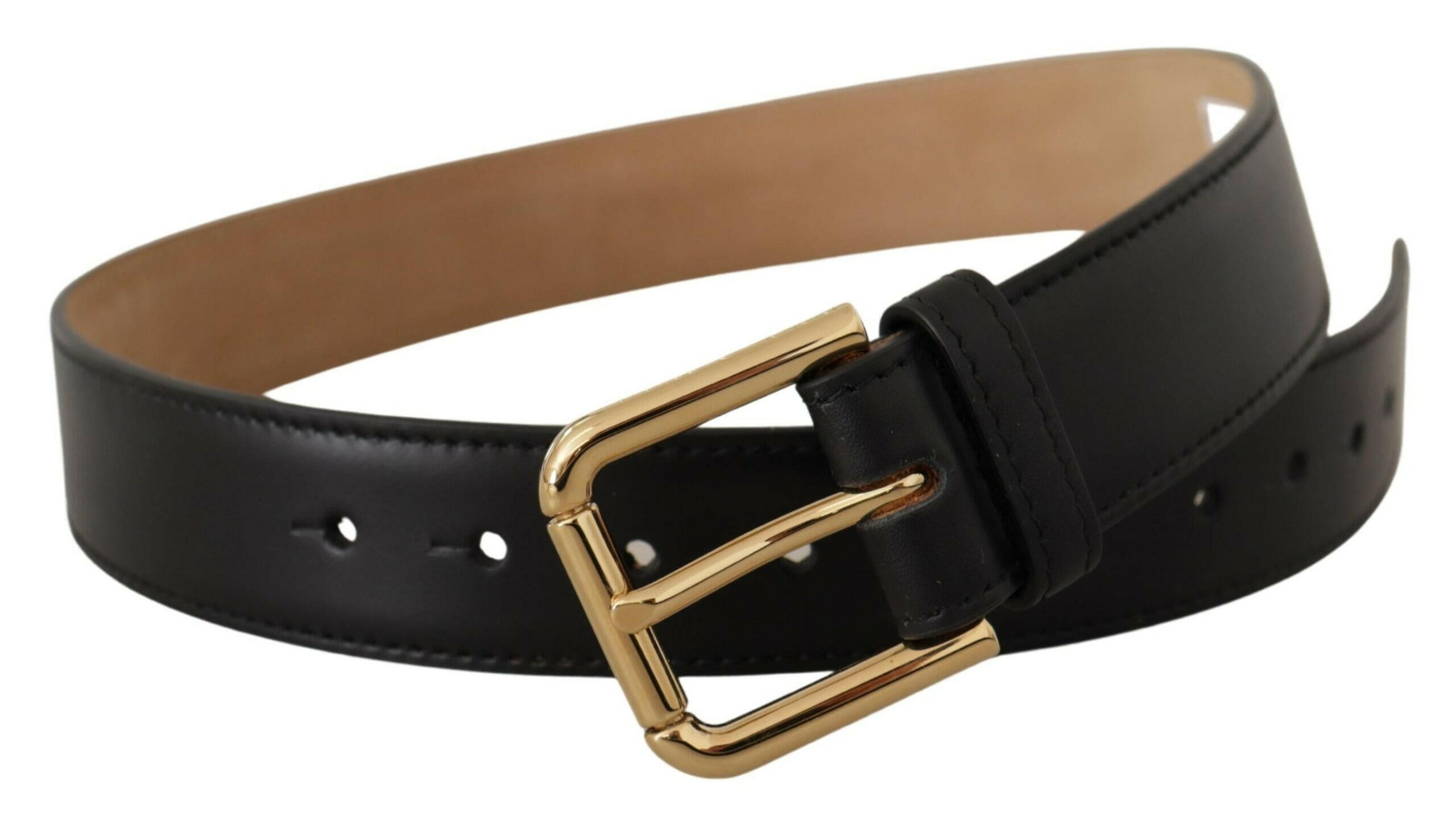 Dolce & Gabbana Black Solid Leather Classic Gold Waist Buckle Belt -   -  Dolce & Gabbana. Dolce & Gabbana Black Solid Leather Classic Gold Waist Buckle Belt -   -  Dolce & Gabbana.
