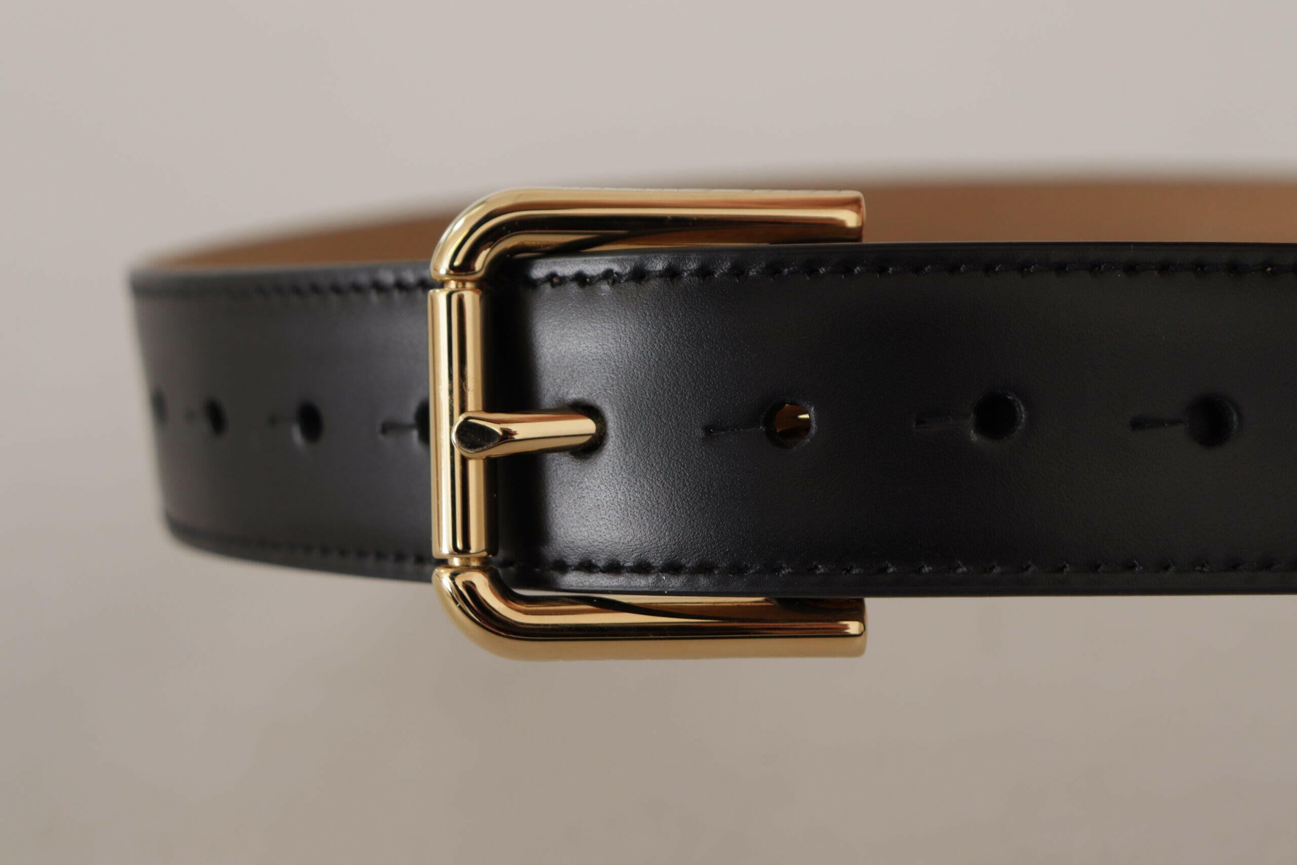 Dolce & Gabbana Black Solid Leather Classic Gold Waist Buckle Belt -   -  Dolce & Gabbana. Dolce & Gabbana Black Solid Leather Classic Gold Waist Buckle Belt -   -  Dolce & Gabbana.