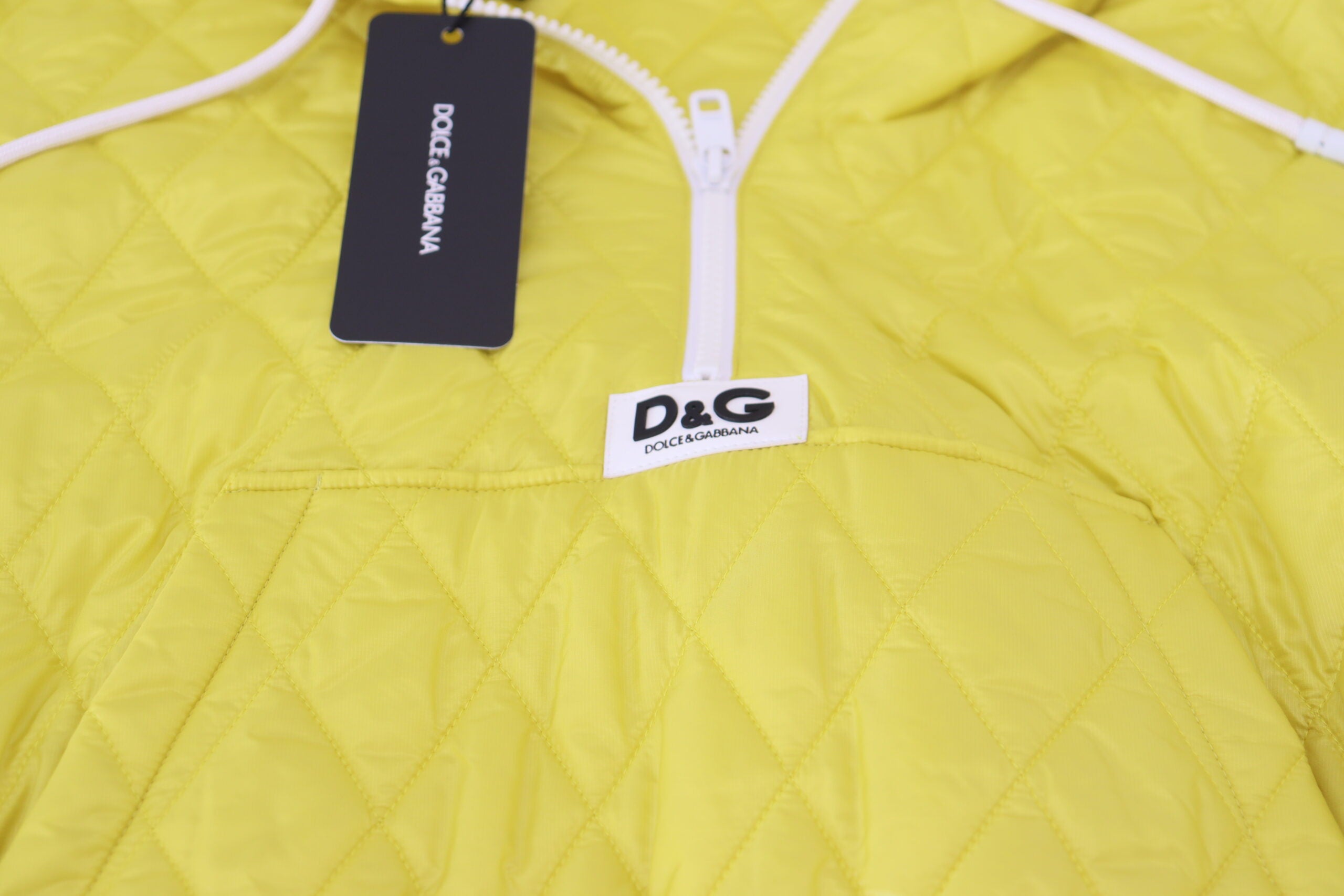 Dolce & Gabbana Yellow Nylon Quilted Hooded Pullover Jacket -   -  Dolce & Gabbana. Dolce & Gabbana Yellow Nylon Quilted Hooded Pullover Jacket -   -  Dolce & Gabbana.