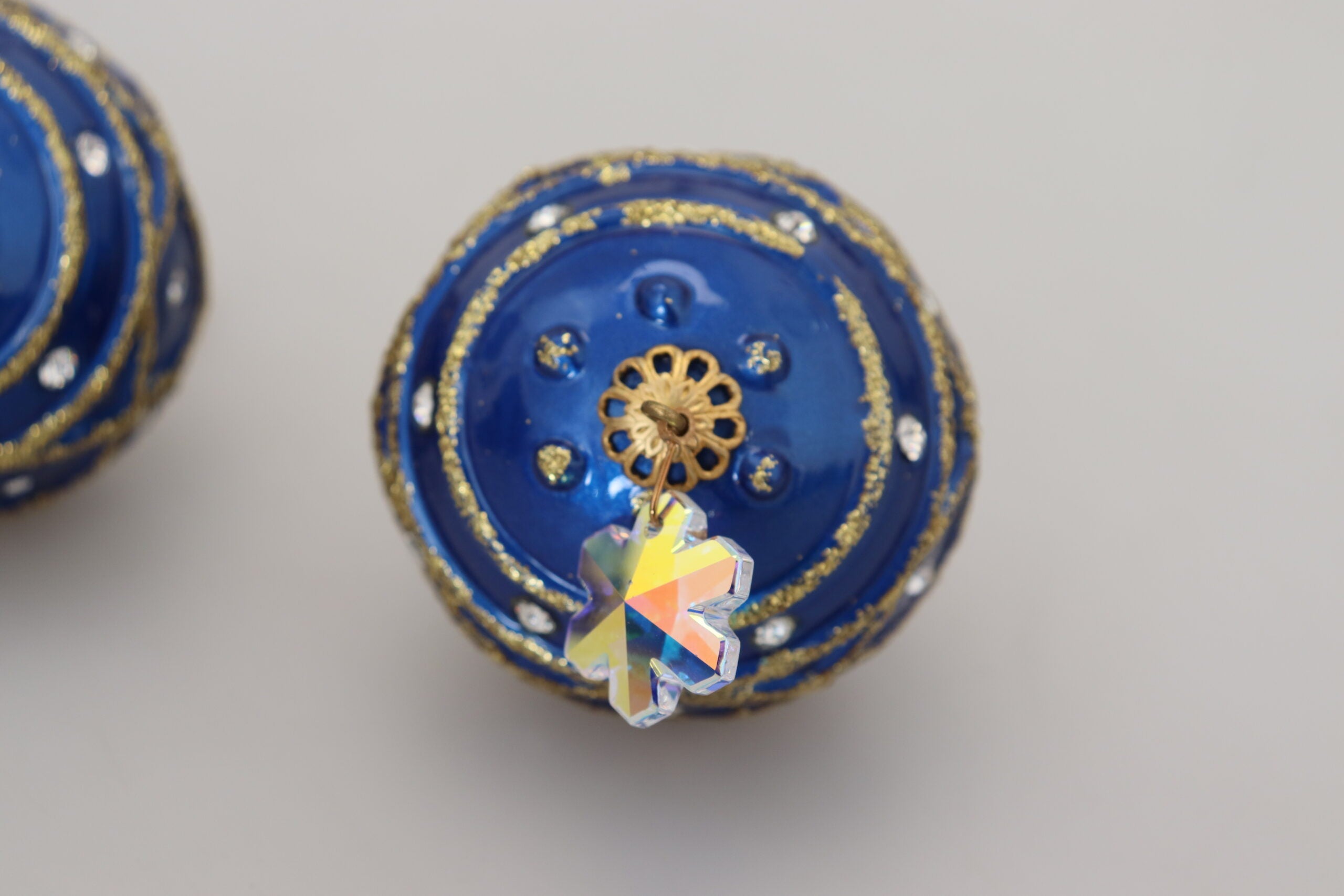 Dolce & Gabbana Gold Brass Blue Dangle Ball Crystal Clip On Earrings -   -  Dolce & Gabbana. Dolce & Gabbana Gold Brass Blue Dangle Ball Crystal Clip On Earrings -   -  Dolce & Gabbana.