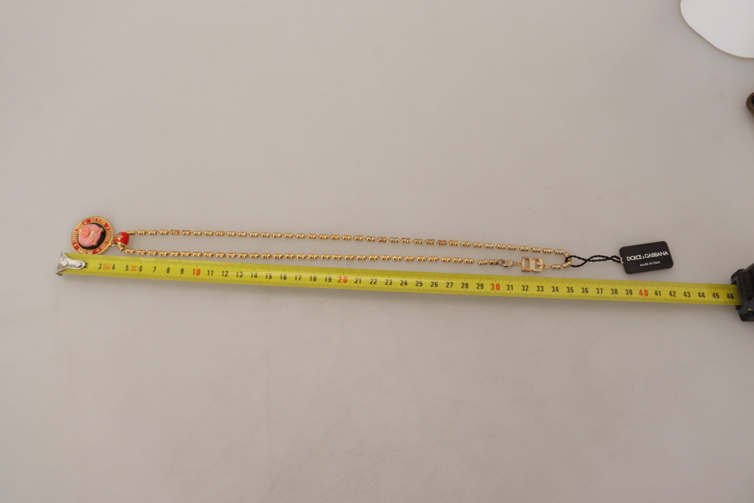 Dolce & Gabbana Gold Brass Chain SUPER PIG Pendant Logo Necklace -   -  Dolce & Gabbana. Dolce & Gabbana Gold Brass Chain SUPER PIG Pendant Logo Necklace -   -  Dolce & Gabbana.