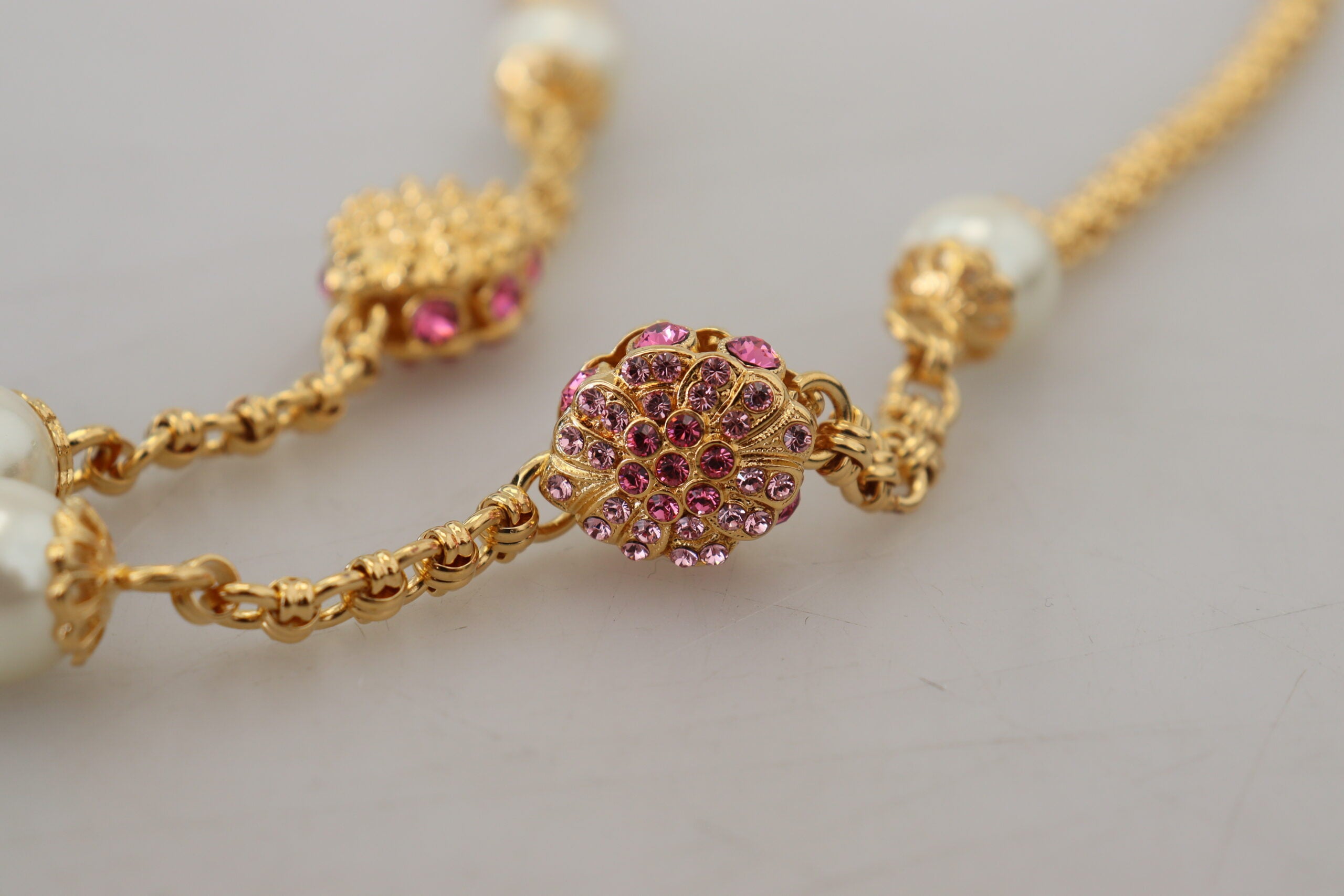 Dolce & Gabbana Gold Tone Floral Crystals Pink Embellished Necklace -   -  Dolce & Gabbana. Dolce & Gabbana Gold Tone Floral Crystals Pink Embellished Necklace -   -  Dolce & Gabbana.