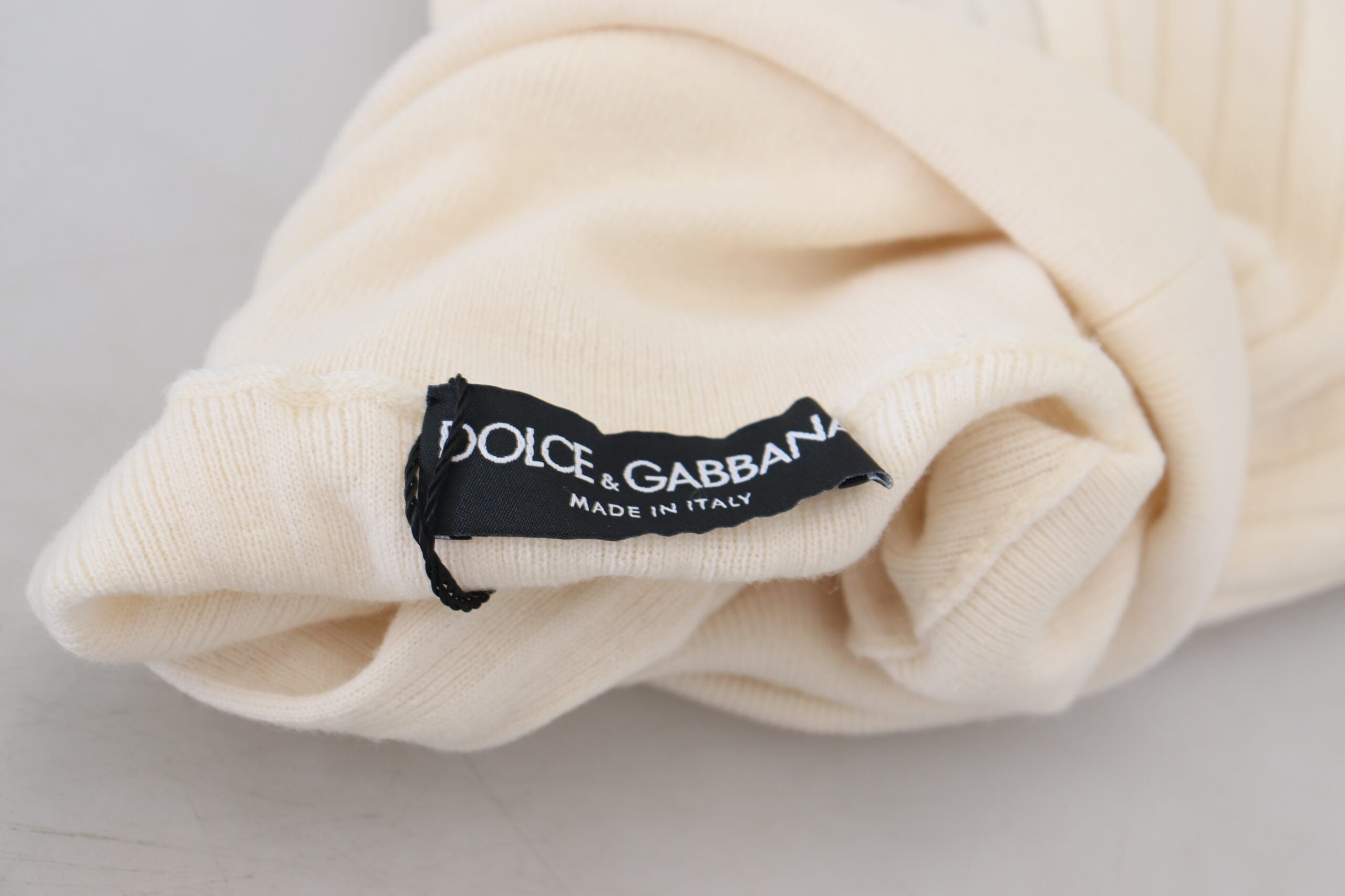 Dolce & Gabbana Ivory Turtleneck Distressed Cuff Pullover Sweater -   -  Dolce & Gabbana. Dolce & Gabbana Ivory Turtleneck Distressed Cuff Pullover Sweater -   -  Dolce & Gabbana.