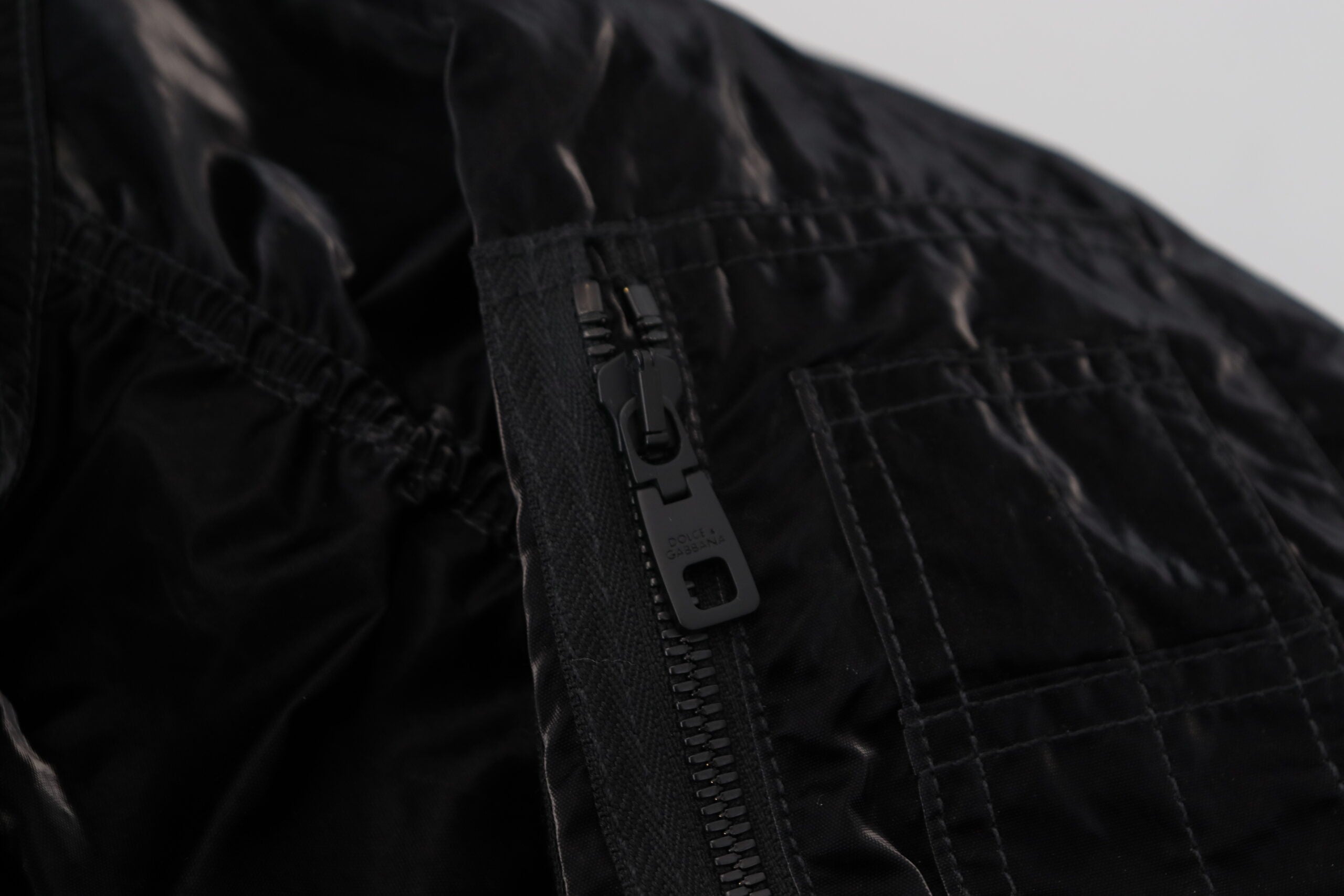 Dolce & Gabbana Black Nylon Hooded Full Zip Bomber Jacket -   -  Dolce & Gabbana. Dolce & Gabbana Black Nylon Hooded Full Zip Bomber Jacket -   -  Dolce & Gabbana.