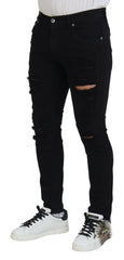 Dolce & Gabbana Black Slim Fit Tattered Denim Cotton Jeans -   -  Dolce & Gabbana.