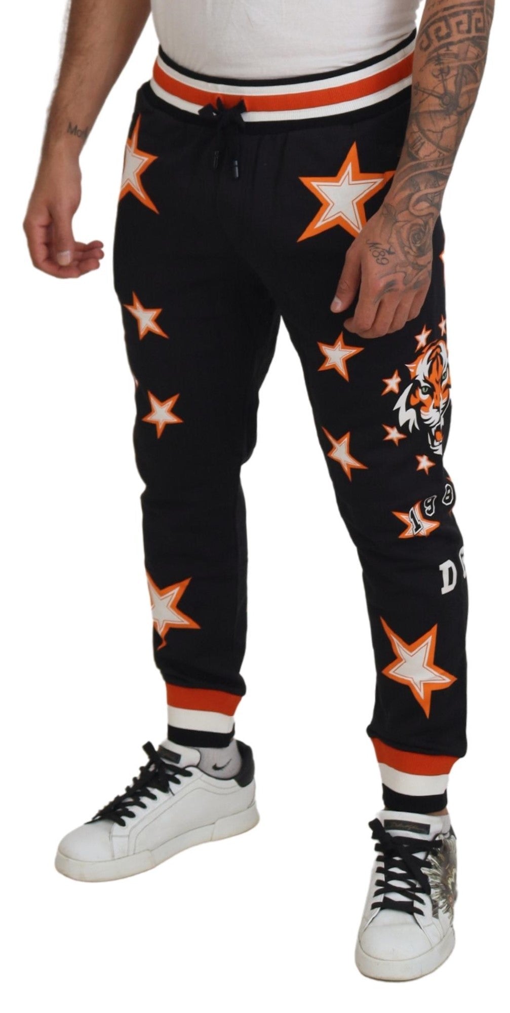Dolce & Gabbana Black Orange Star Trousers Sport Pants -   -  Dolce & Gabbana. Dolce & Gabbana Black Orange Star Trousers Sport Pants -   -  Dolce & Gabbana.
