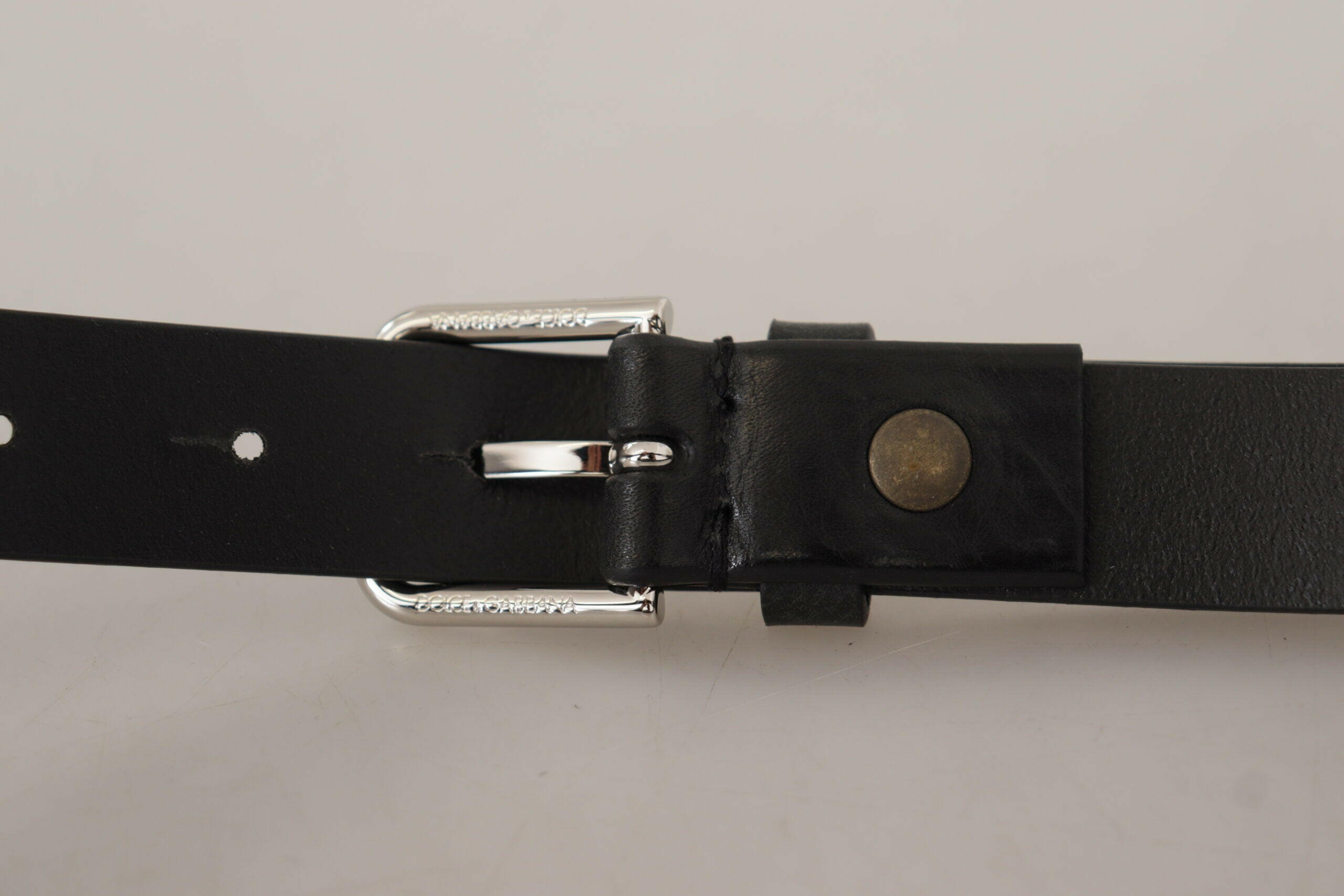 Dolce & Gabbana Black Calf Leather Silver Tone Logo Metal Buckle Belt -   -  Dolce & Gabbana. Dolce & Gabbana Black Calf Leather Silver Tone Logo Metal Buckle Belt -   -  Dolce & Gabbana.