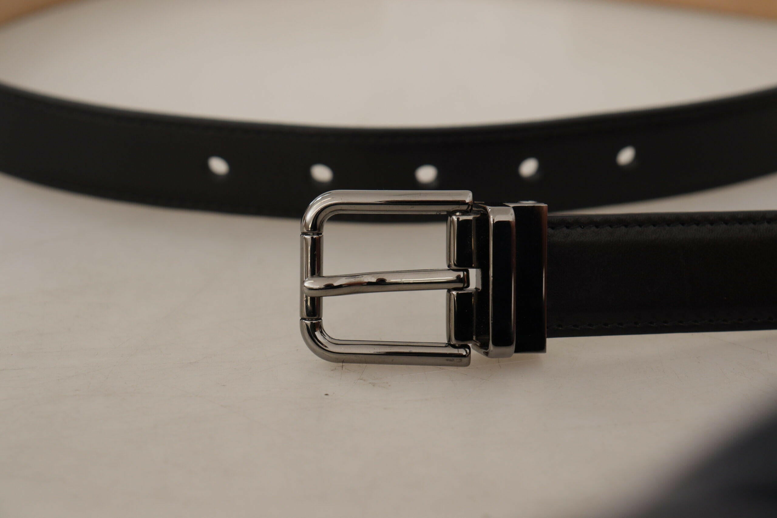 Dolce & Gabbana Black Calf Leather Logo Engraved Metal Buckle Belt -   -  Dolce & Gabbana. Dolce & Gabbana Black Calf Leather Logo Engraved Metal Buckle Belt -   -  Dolce & Gabbana.