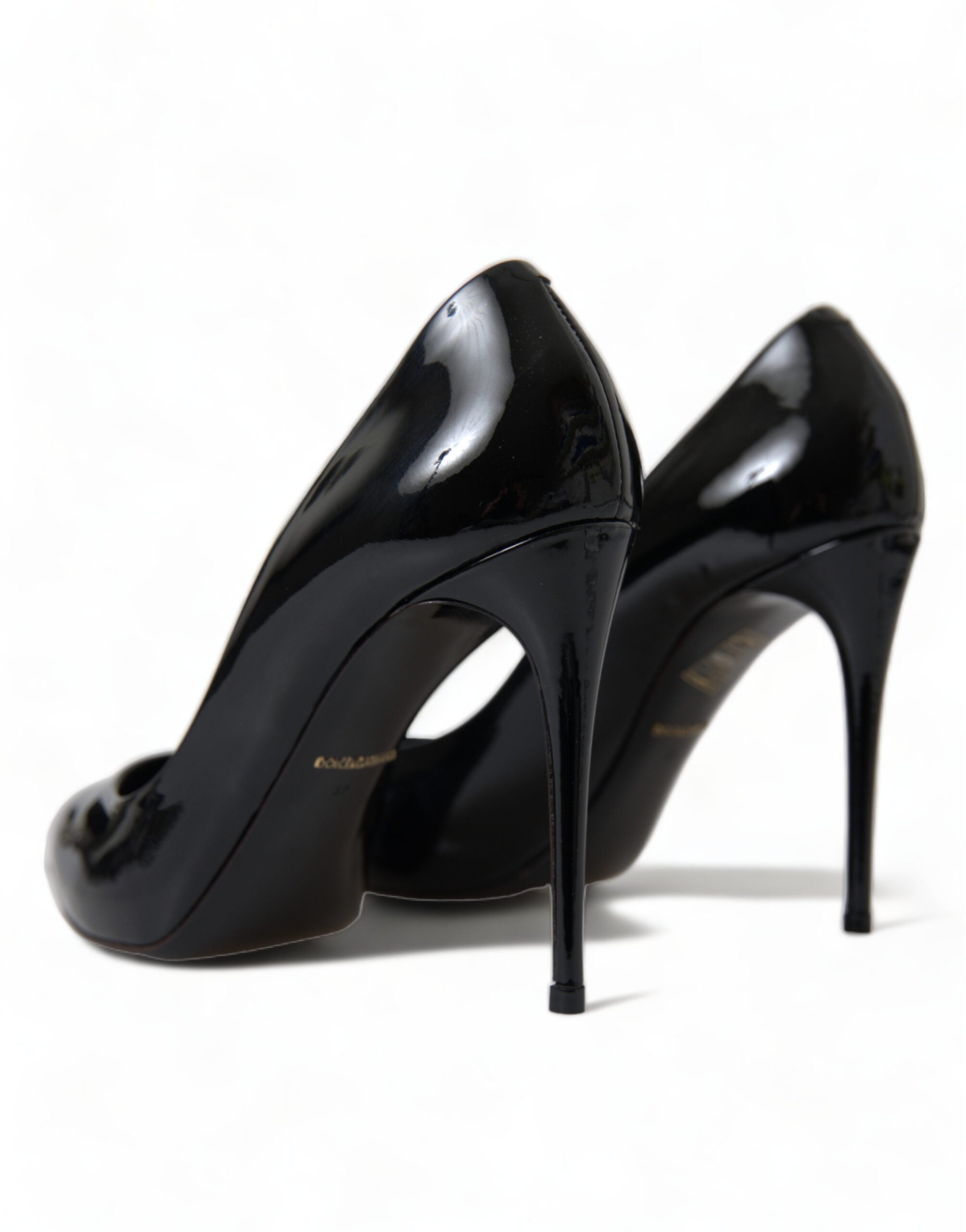 Dolce & Gabbana Black Patent Leather Pumps Heels Shoes -   -  Dolce & Gabbana. Dolce & Gabbana Black Patent Leather Pumps Heels Shoes -   -  Dolce & Gabbana.