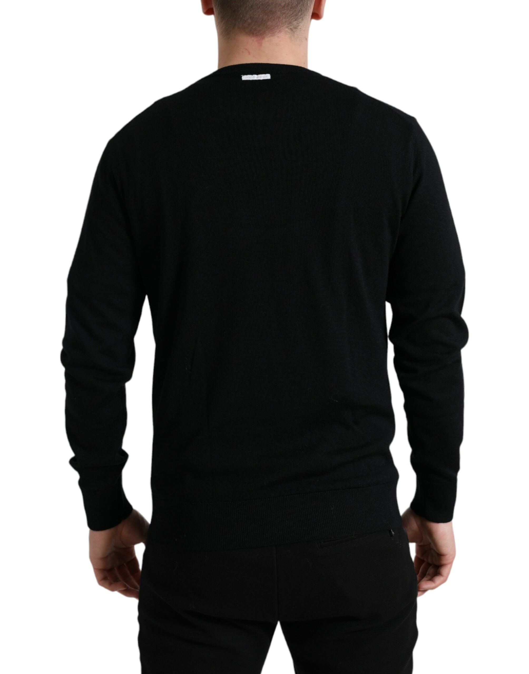 Dolce & Gabbana Black Wool Round Neck Pullover Sweater -   -  Dolce & Gabbana. Dolce & Gabbana Black Wool Round Neck Pullover Sweater -   -  Dolce & Gabbana.