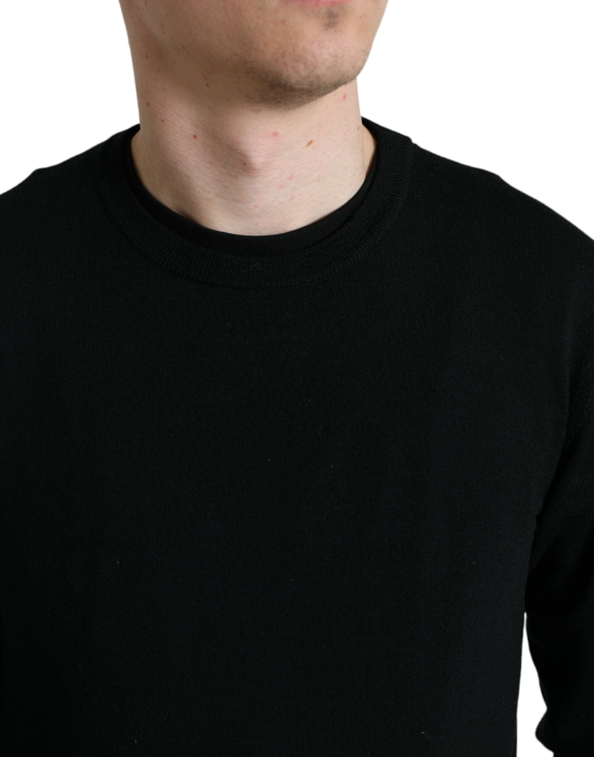 Dolce & Gabbana Black Wool Round Neck Pullover Sweater -   -  Dolce & Gabbana. Dolce & Gabbana Black Wool Round Neck Pullover Sweater -   -  Dolce & Gabbana.