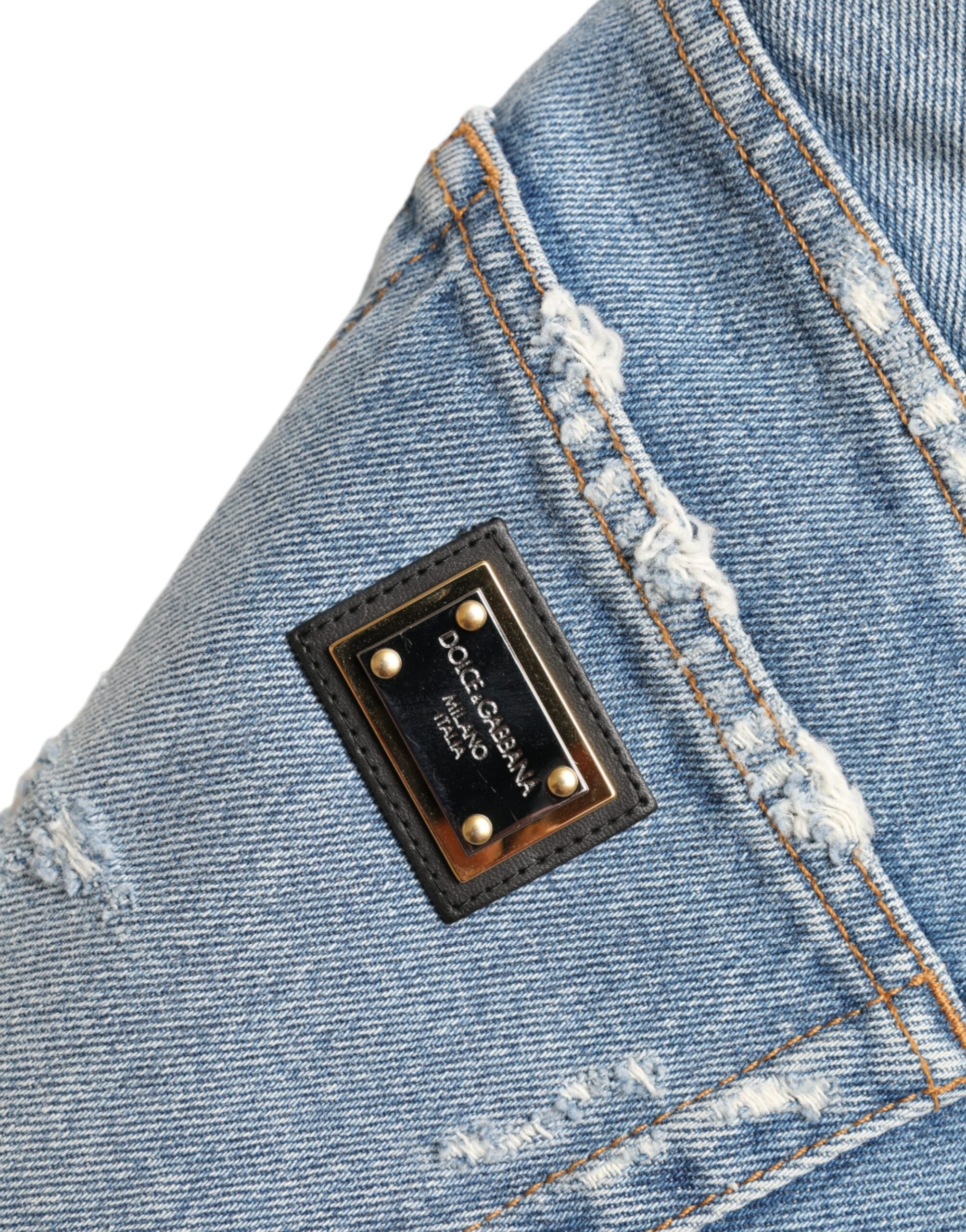 Dolce & Gabbana Blue Tattered Embellished Bermuda Shorts -   -  Dolce & Gabbana. Dolce & Gabbana Blue Tattered Embellished Bermuda Shorts -   -  Dolce & Gabbana.