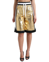 Dolce & Gabbana Gold Polyester Perforated High Waist Shorts -   -  Dolce & Gabbana.