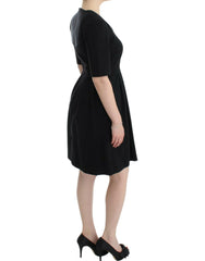 CO|TE Black short sleeve venus dress -   -  CO|TE.