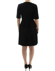 CO|TE Black short sleeve venus dress -   -  CO|TE.