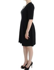 CO|TE Black short sleeve venus dress -   -  CO|TE.