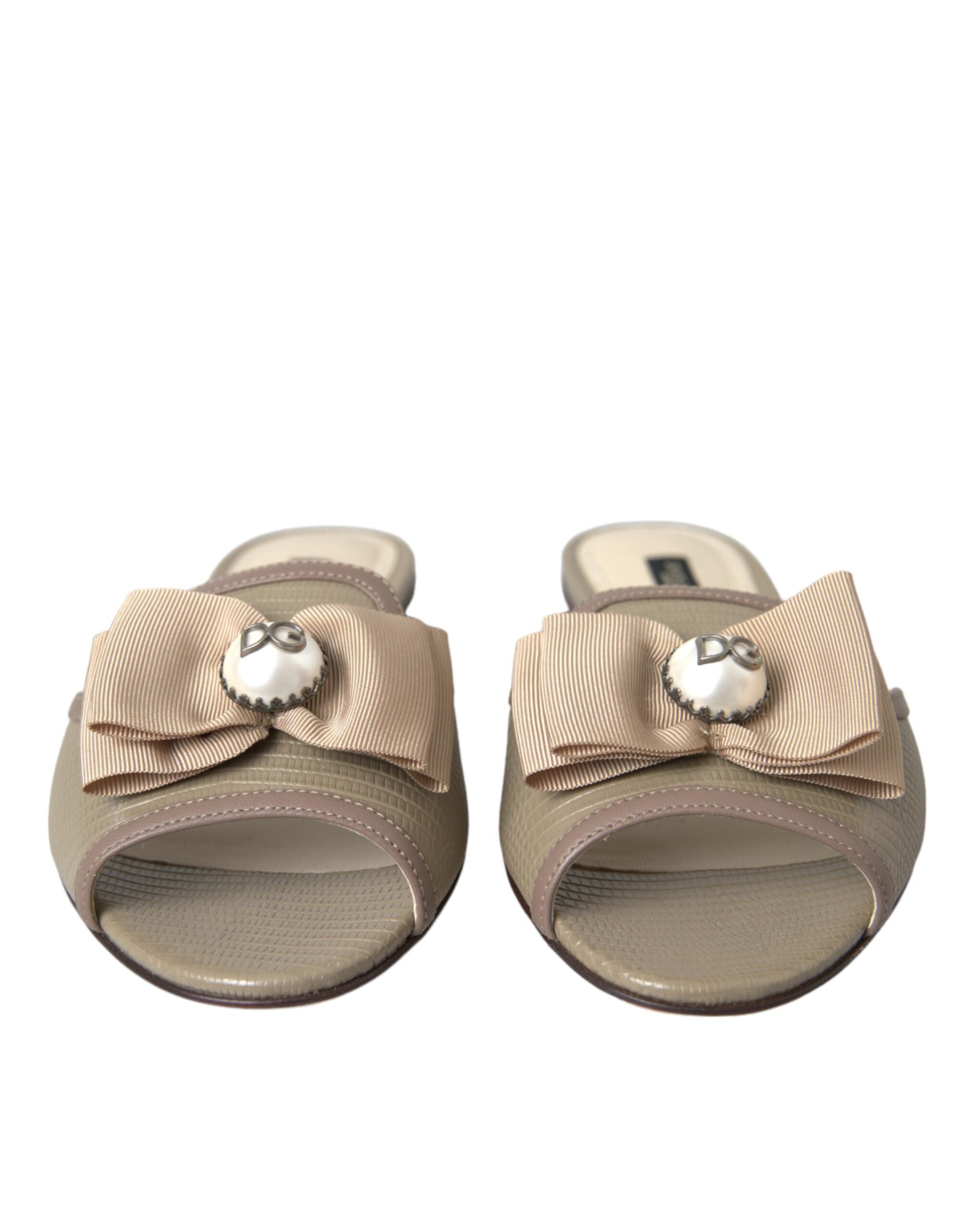 Dolce & Gabbana Beige Logo Pearl Flats Sandals Slides Shoes -   -  Dolce & Gabbana. Dolce & Gabbana Beige Logo Pearl Flats Sandals Slides Shoes -   -  Dolce & Gabbana.