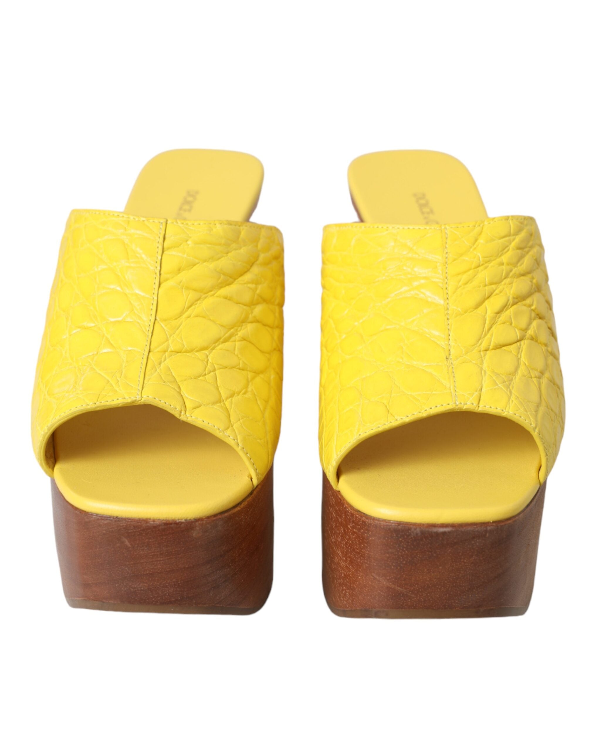Dolce & Gabbana Yellow Leather Wood Mule Wedge Slides Shoes -   -  Dolce & Gabbana. Dolce & Gabbana Yellow Leather Wood Mule Wedge Slides Shoes -   -  Dolce & Gabbana.