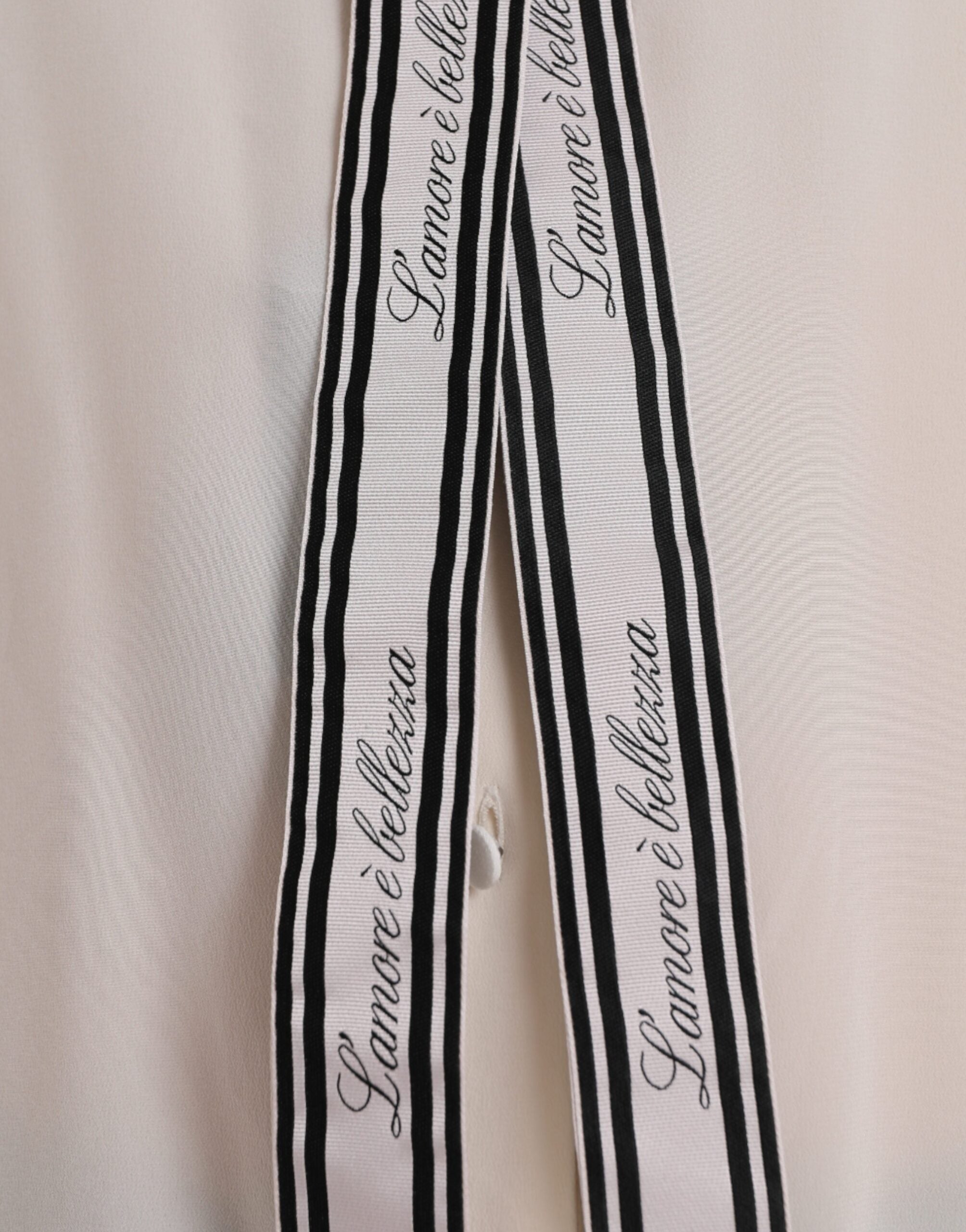 Dolce & Gabbana Off White Long Sleeve Button Down Blouse Top -   -  Dolce & Gabbana. Dolce & Gabbana Off White Long Sleeve Button Down Blouse Top -   -  Dolce & Gabbana.