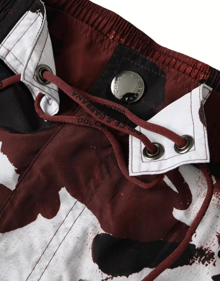 Dolce & Gabbana Multicolor Camouflage DG Logo Beachwear Shorts Swimwear -   -  Dolce & Gabbana. Dolce & Gabbana Multicolor Camouflage DG Logo Beachwear Shorts Swimwear -   -  Dolce & Gabbana.