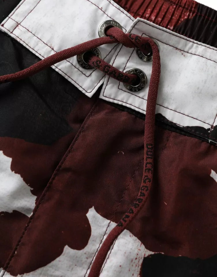 Dolce & Gabbana Multicolor Camouflage DG Logo Beachwear Shorts Swimwear -   -  Dolce & Gabbana. Dolce & Gabbana Multicolor Camouflage DG Logo Beachwear Shorts Swimwear -   -  Dolce & Gabbana.