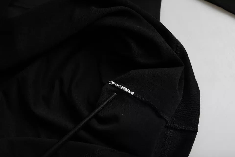 Dolce & Gabbana Black Logo Embossed Cotton Crew Neck T-shirt -   -  Dolce & Gabbana. Dolce & Gabbana Black Logo Embossed Cotton Crew Neck T-shirt -   -  Dolce & Gabbana.