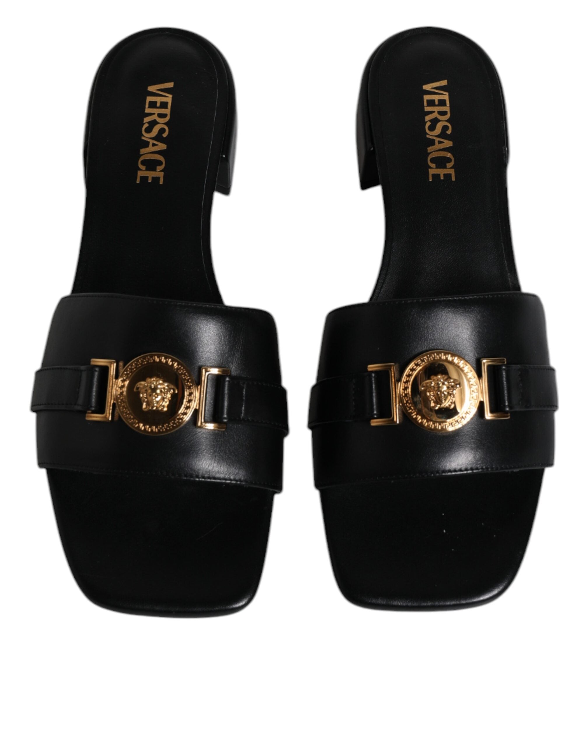 Versace Black Leather Logo Plaque Slip On Slides Flats Shoes -   -  Versace. Versace Black Leather Logo Plaque Slip On Slides Flats Shoes -   -  Versace.