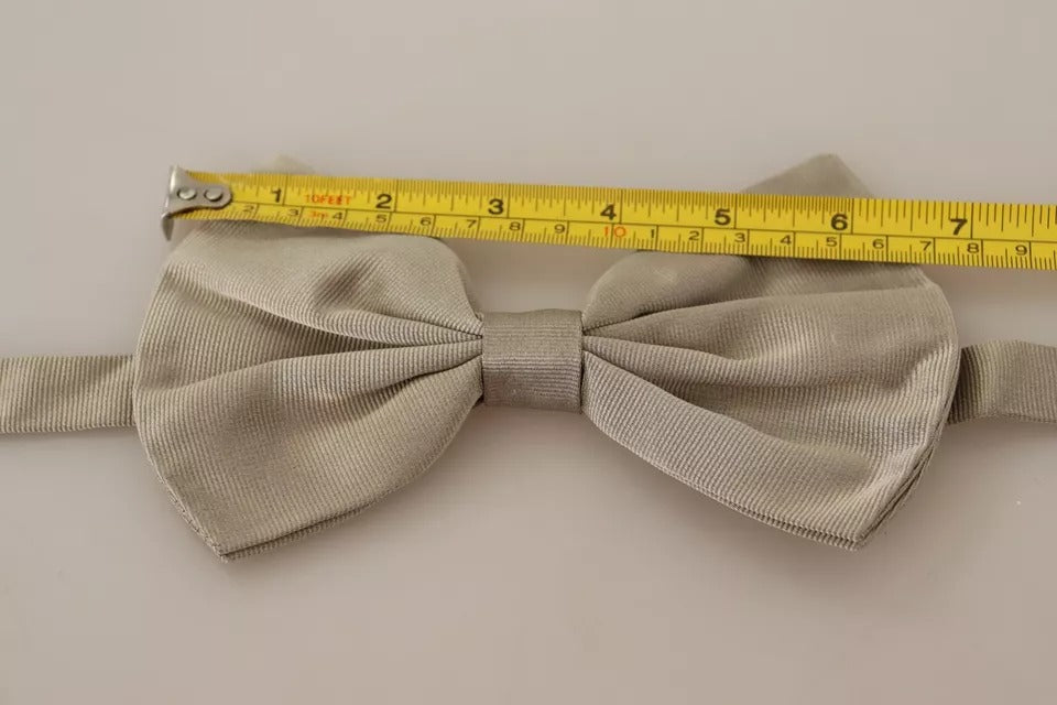 Dolce & Gabbana Silver Gray 100% Silk Adjustable Neck Bow Tie -   -  Dolce & Gabbana. Dolce & Gabbana Silver Gray 100% Silk Adjustable Neck Bow Tie -   -  Dolce & Gabbana.