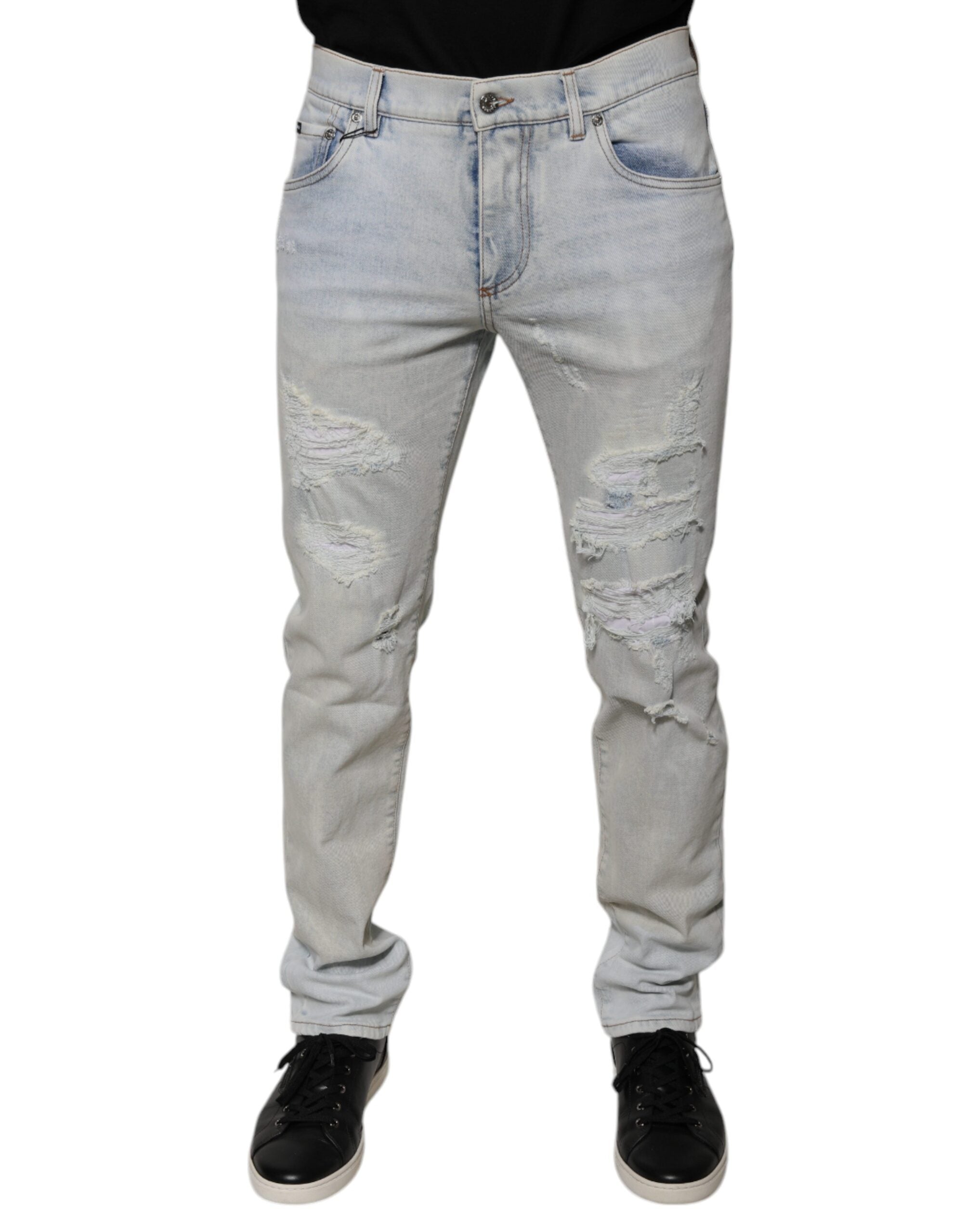 Dolce & Gabbana Light Blue Cotton Blend Tattered Skinny Denim Jeans -   -  Dolce & Gabbana. Dolce & Gabbana Light Blue Cotton Blend Tattered Skinny Denim Jeans -   -  Dolce & Gabbana.