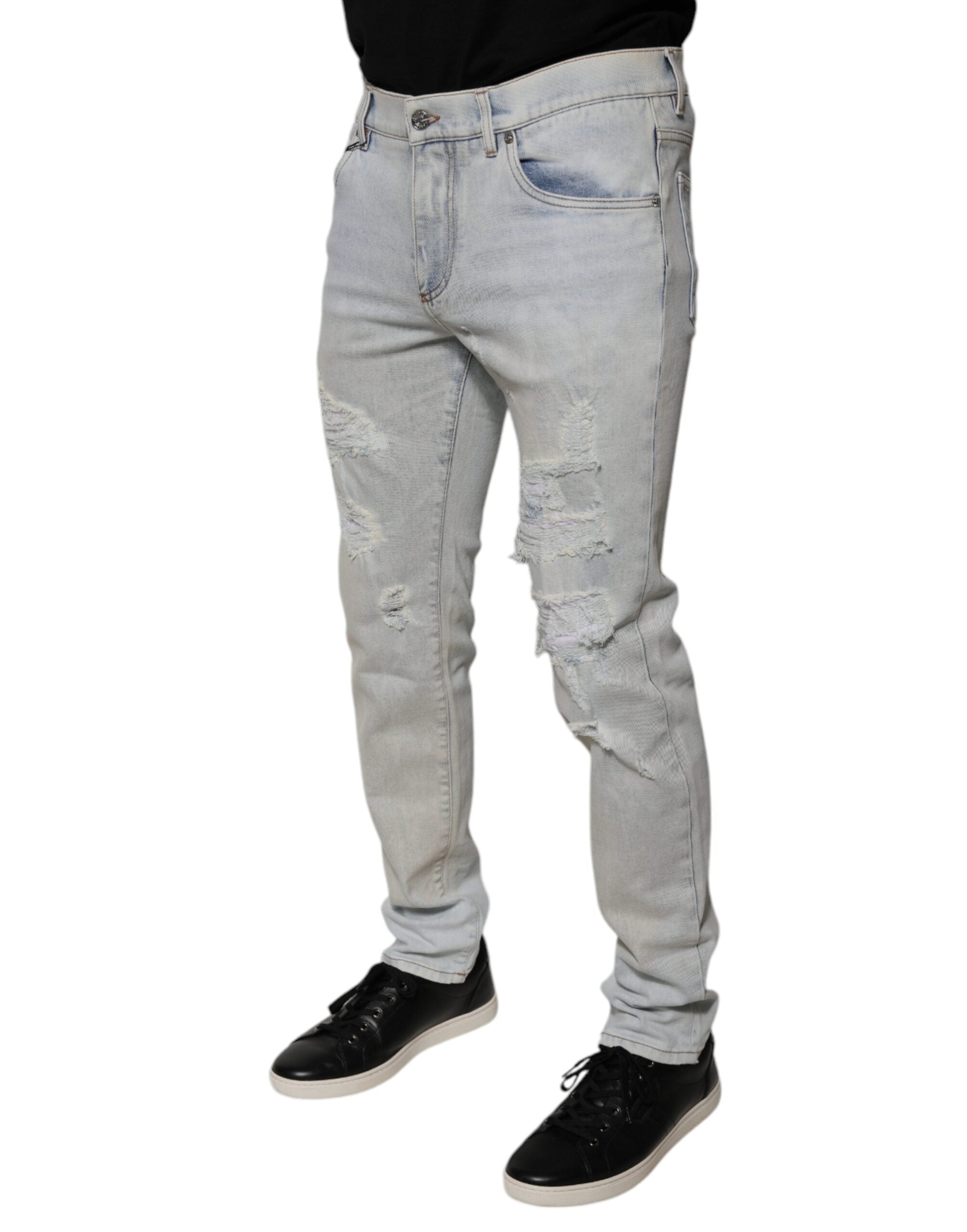 Dolce & Gabbana Light Blue Cotton Blend Tattered Skinny Denim Jeans -   -  Dolce & Gabbana. Dolce & Gabbana Light Blue Cotton Blend Tattered Skinny Denim Jeans -   -  Dolce & Gabbana.