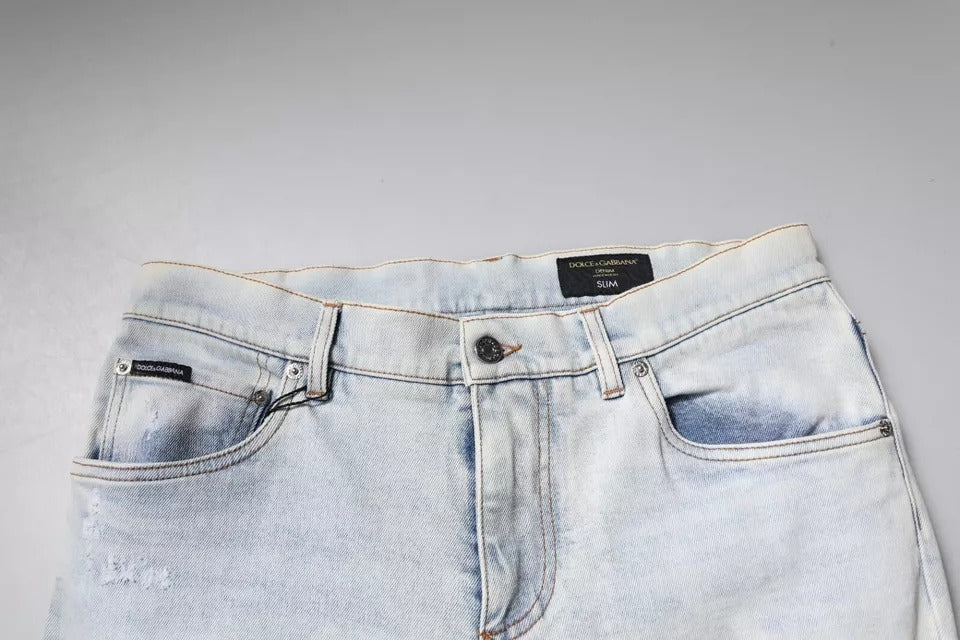 Dolce & Gabbana Light Blue Cotton Blend Tattered Skinny Denim Jeans -   -  Dolce & Gabbana. Dolce & Gabbana Light Blue Cotton Blend Tattered Skinny Denim Jeans -   -  Dolce & Gabbana.