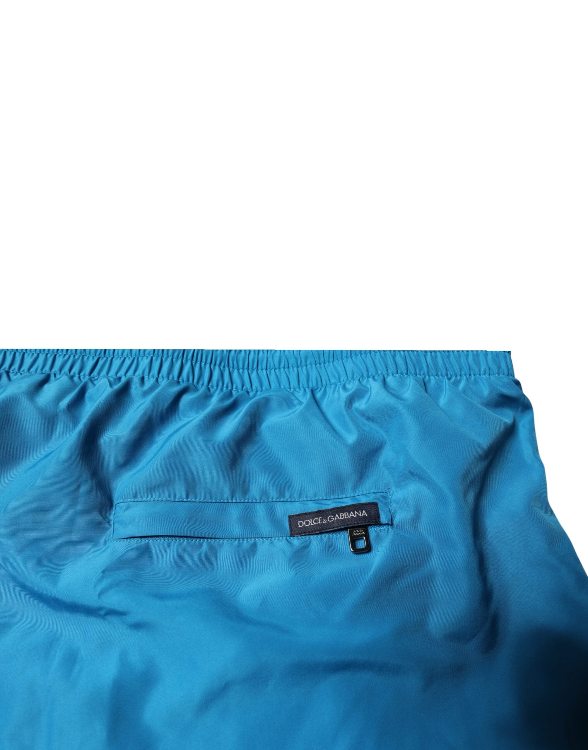 Dolce & Gabbana Turquoise Logo Beachwear Shorts 2Pc Swimwear -   -  Dolce & Gabbana. Dolce & Gabbana Turquoise Logo Beachwear Shorts 2Pc Swimwear -   -  Dolce & Gabbana.