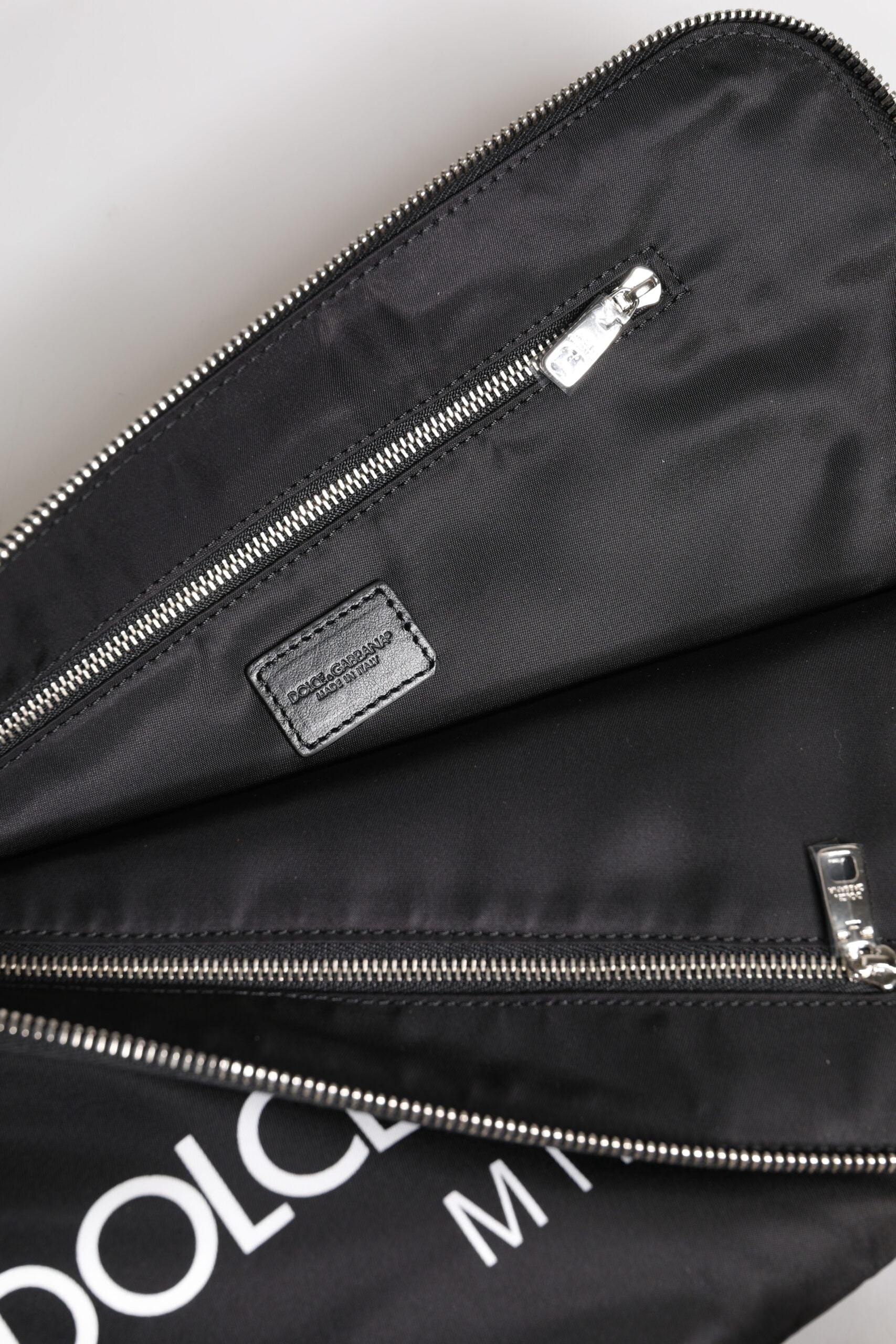 Dolce & Gabbana Black DG Milano Print Nylon Pouch Clutch Bag -   -  Dolce & Gabbana. Dolce & Gabbana Black DG Milano Print Nylon Pouch Clutch Bag -   -  Dolce & Gabbana.