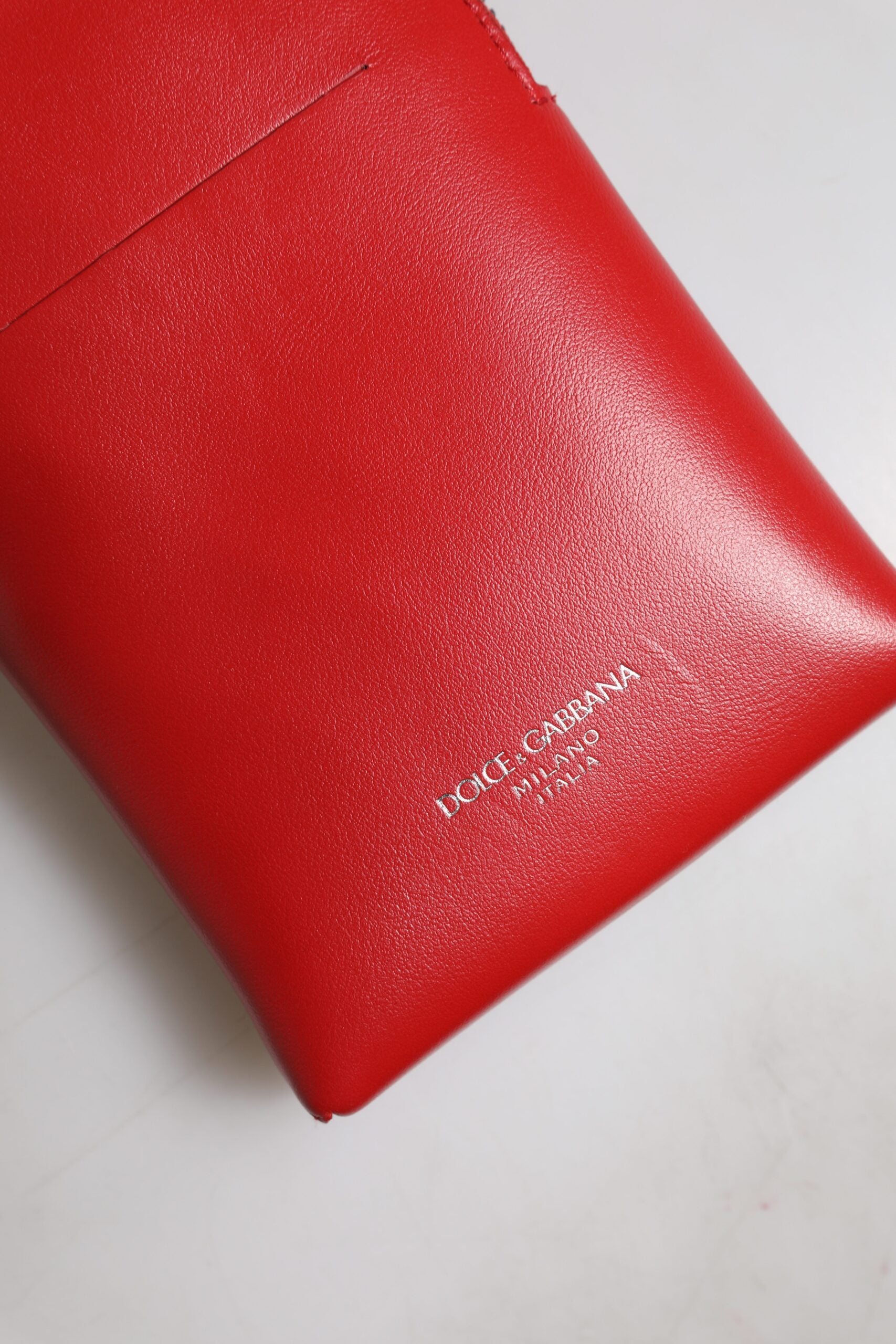 Dolce & Gabbana Red Leather Purse Phone Sling Crossbody Neck Strap Bag -   -  Dolce & Gabbana. Dolce & Gabbana Red Leather Purse Phone Sling Crossbody Neck Strap Bag -   -  Dolce & Gabbana.