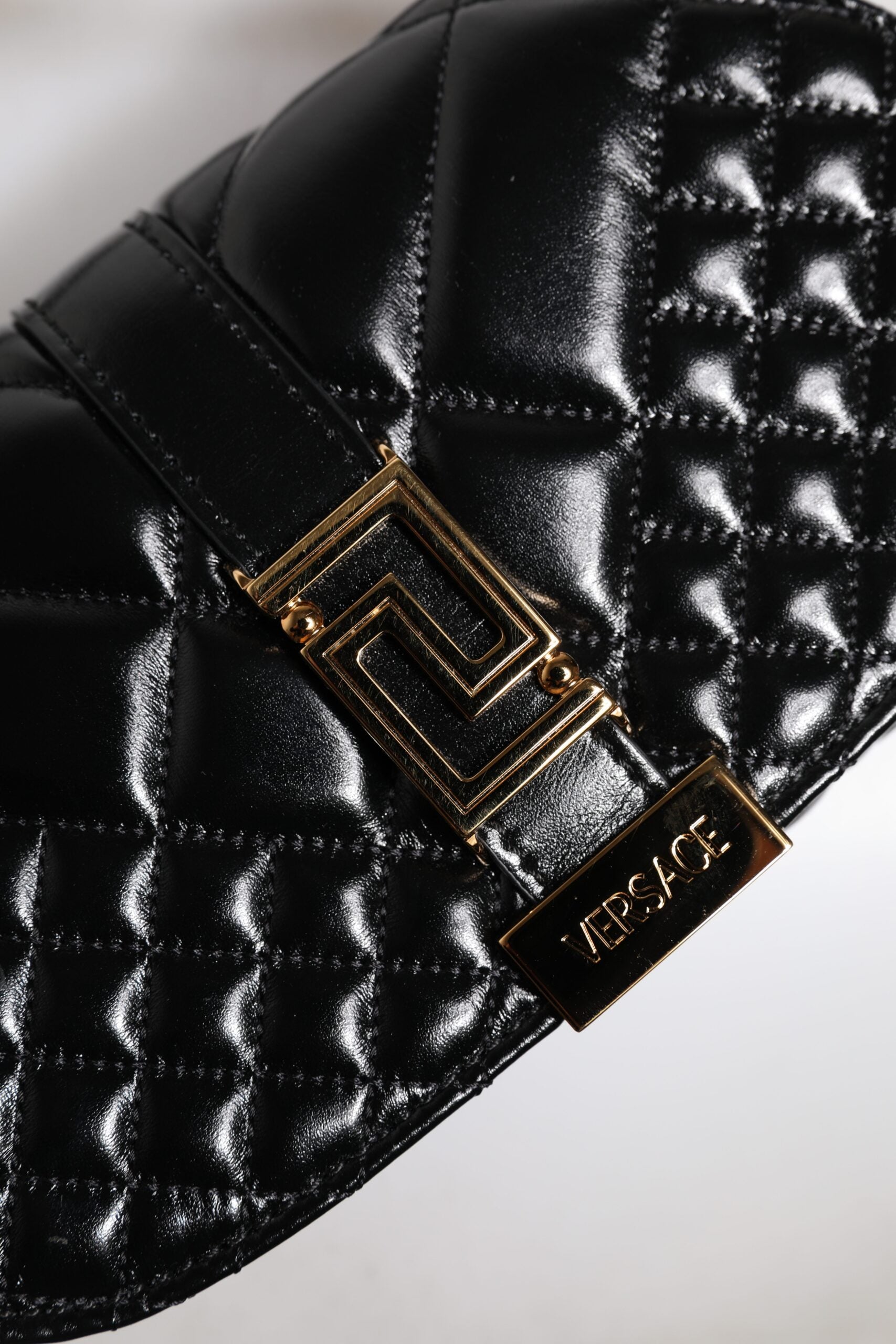 Versace Black Calf Leather Quilted Shoulder Strap Bag -   -  Versace. Versace Black Calf Leather Quilted Shoulder Strap Bag -   -  Versace.