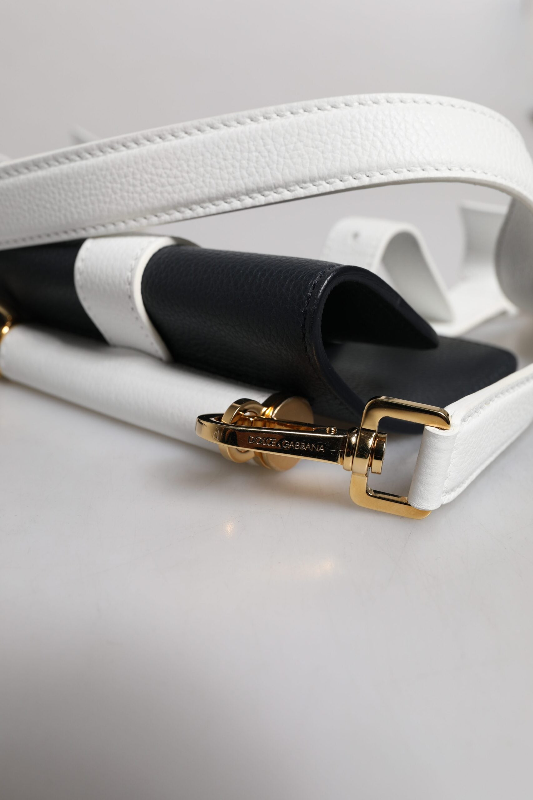 Dolce & Gabbana Blue White Calfskin Leather Crossbody Shoulder Bag -   -  Dolce & Gabbana. Dolce & Gabbana Blue White Calfskin Leather Crossbody Shoulder Bag -   -  Dolce & Gabbana.